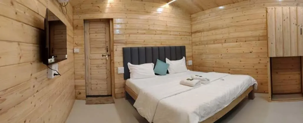 Bed in Raapan Beach Resort