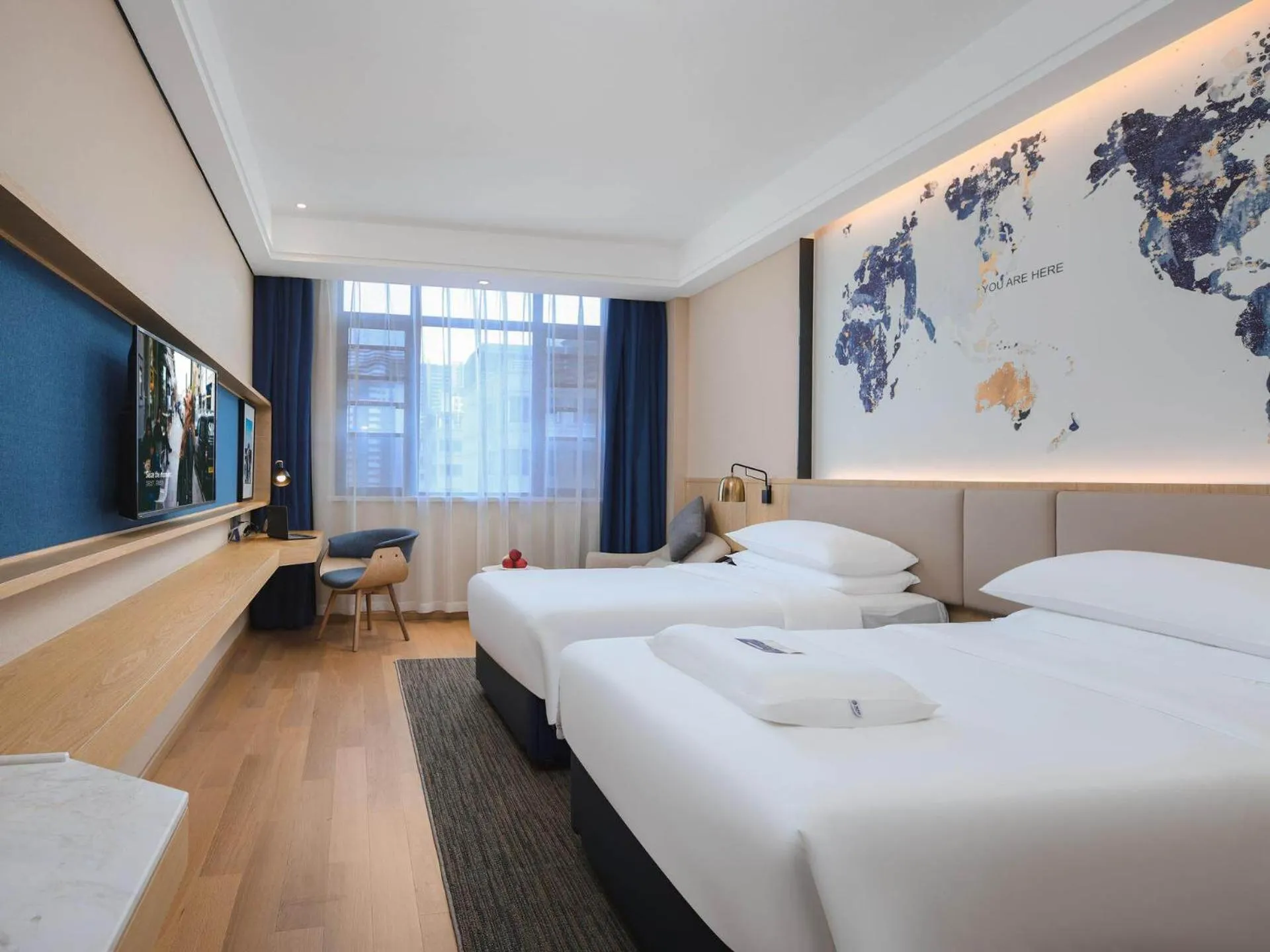 Bed in Kyriad Marvelous Hotel Bozhou Wanda Plaza