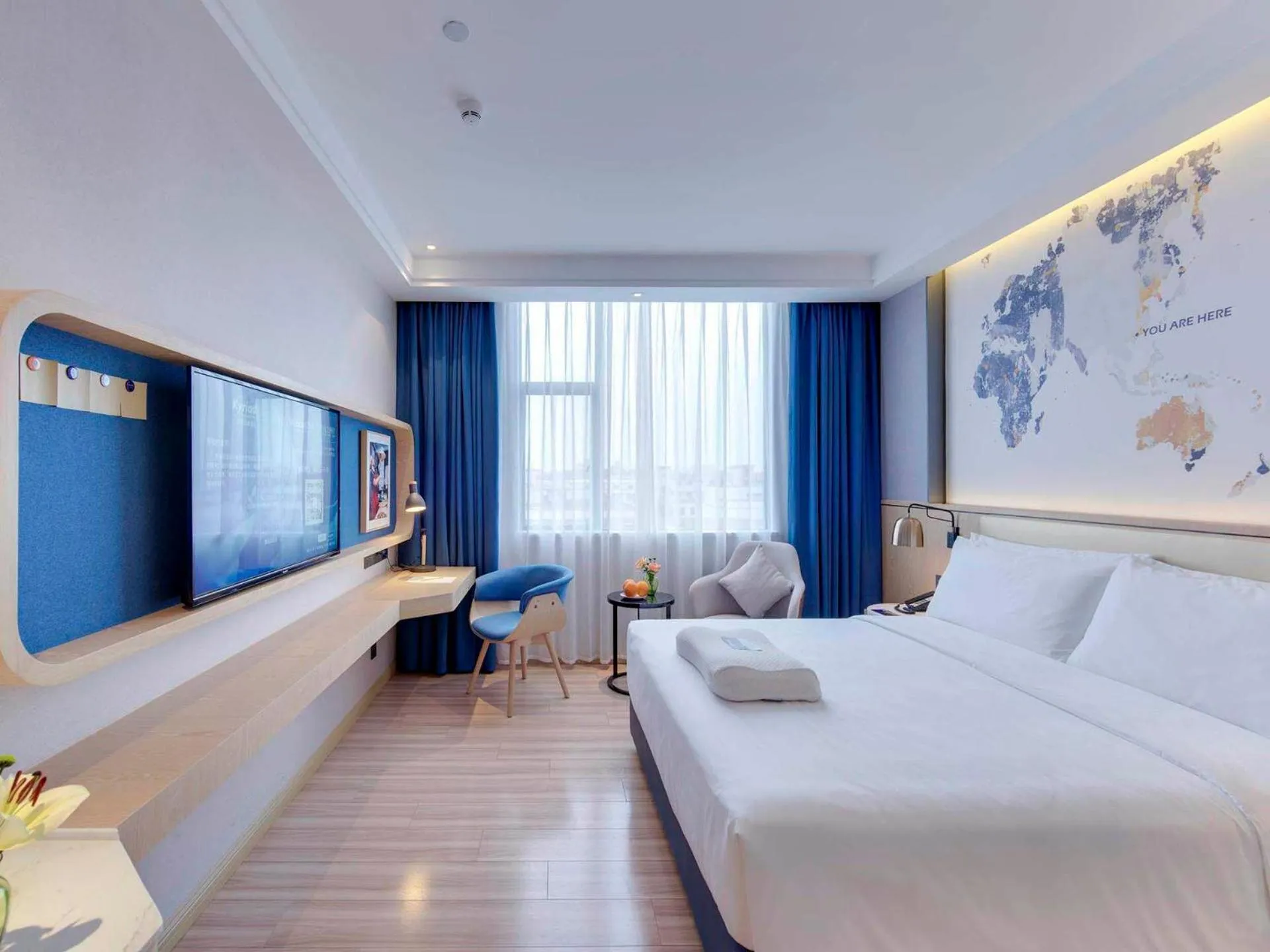 Bed in Kyriad Marvelous Hotel Guangzhou Baiyun International Airport