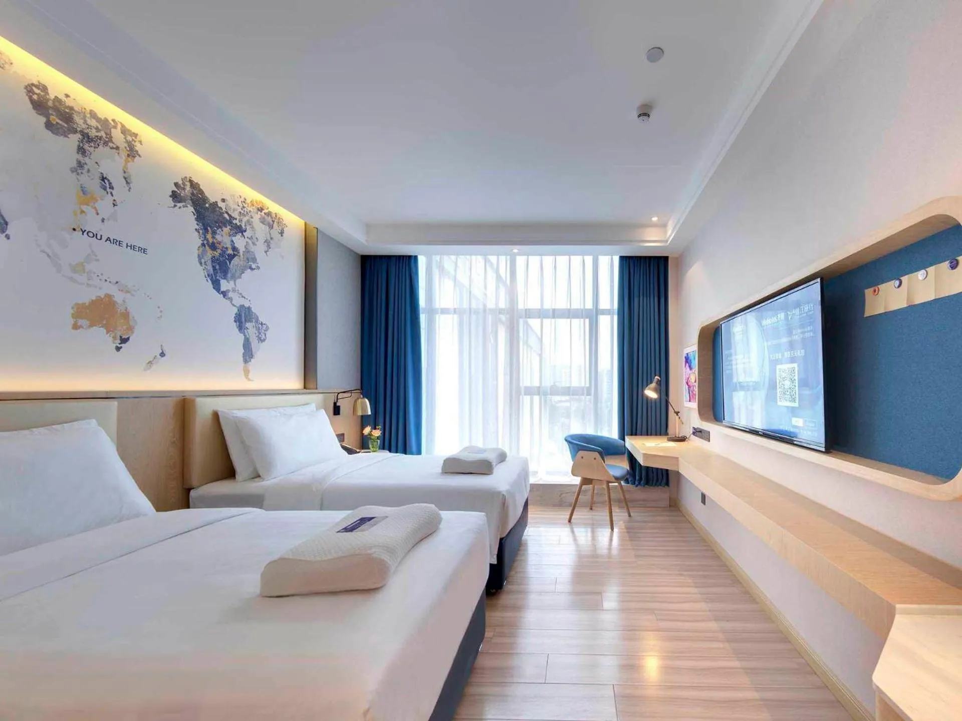 Bed in Kyriad Marvelous Hotel Guangzhou Baiyun International Airport