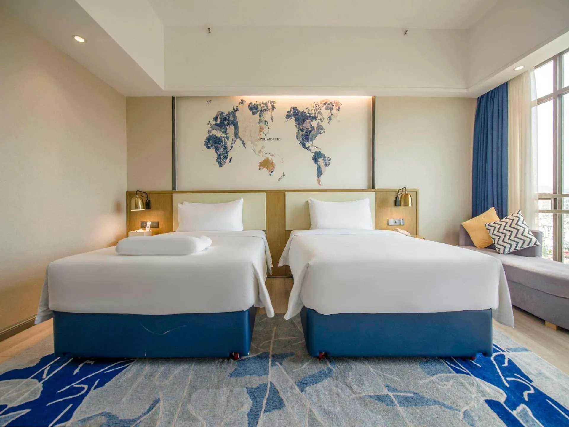 Bed in Kyriad Marvelous Hotel Qingyuan City Square