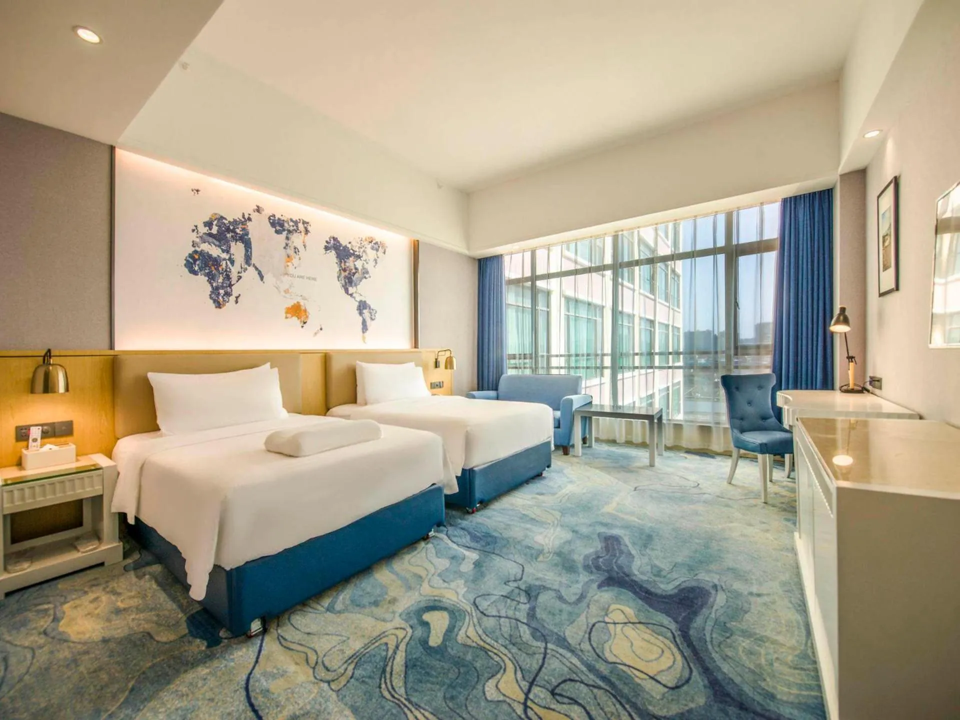 Bed in Kyriad Marvelous Hotel Qingyuan City Square