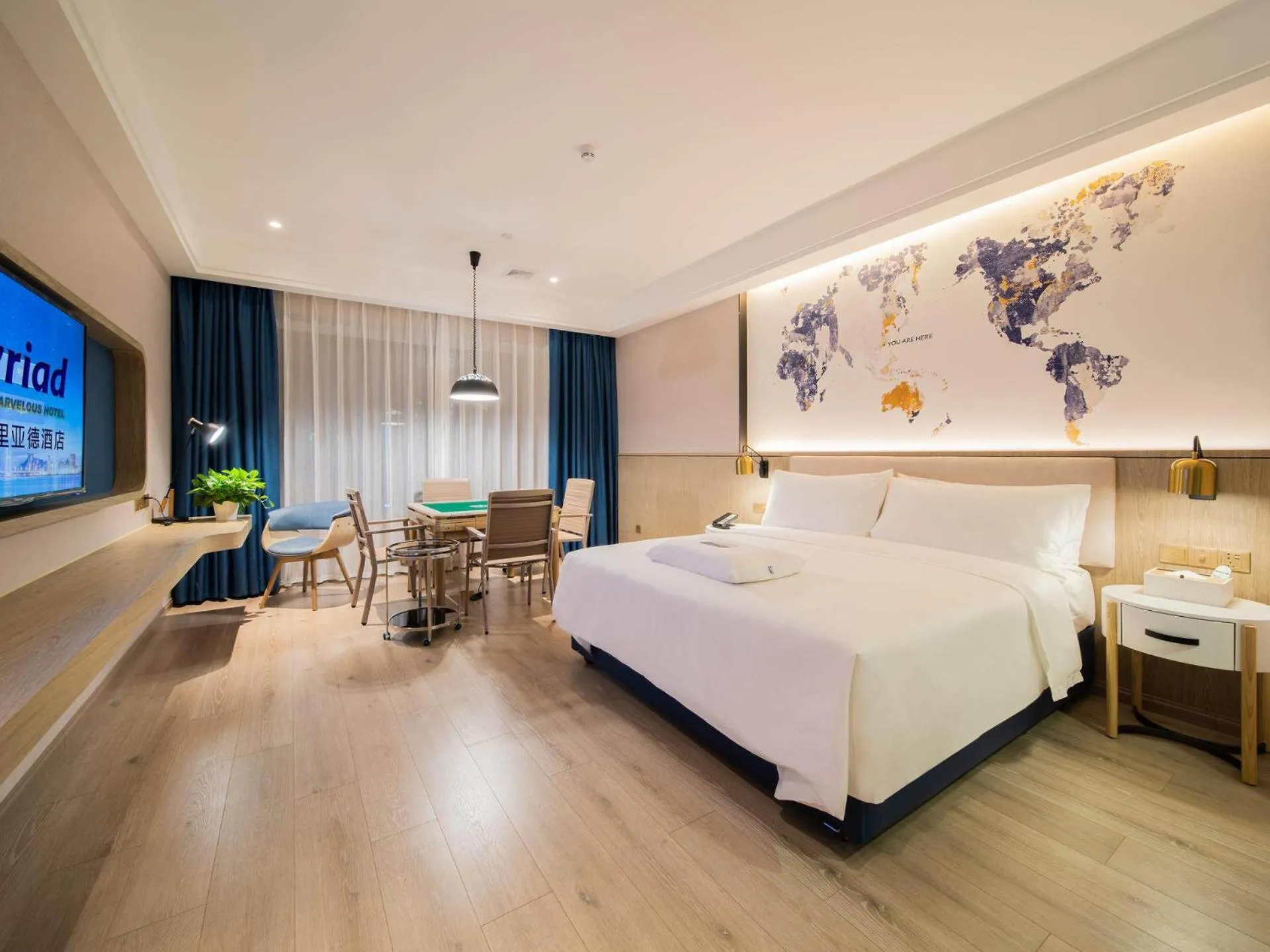 Bed in Kyriad Marvelous Hotel Heyuan Hakka Culture Park