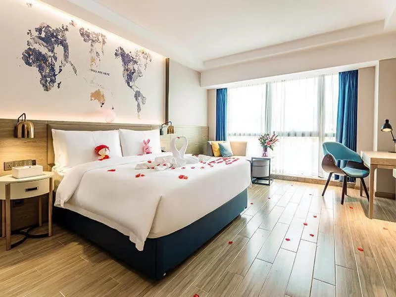 Bed in Kyriad Marvelous Hotel Shenzhen Linheng Plaza Liuyue Subway Station