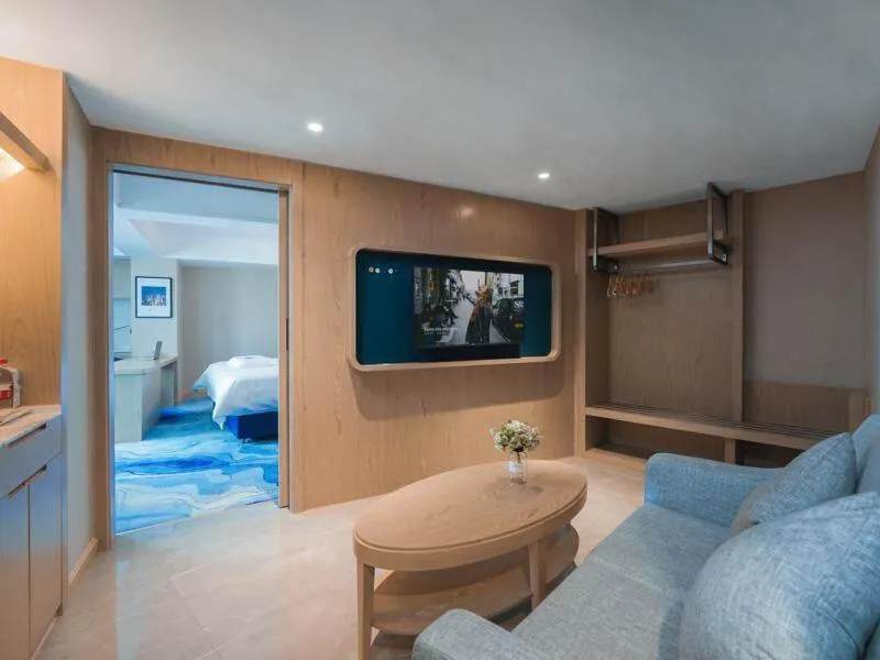 Bed in Kyriad Marvelous Hotel Shenzhen Guangming Zhenmei Subway Station