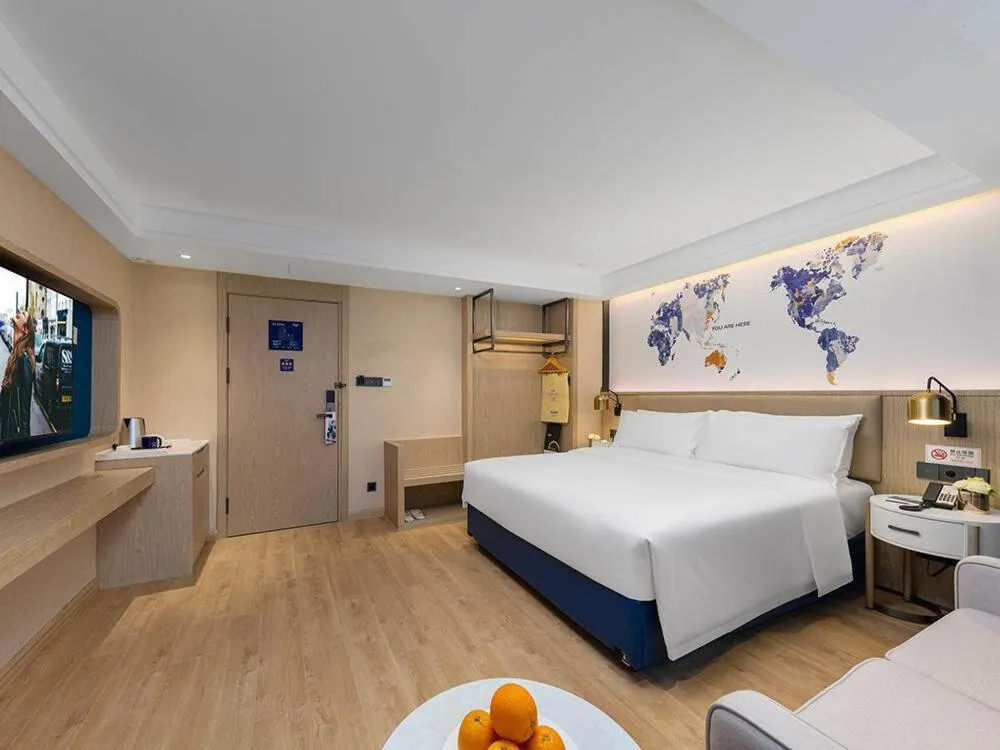 Bed in Kyriad Marvelous Hotel Shenzhen Nanlian Metro Station