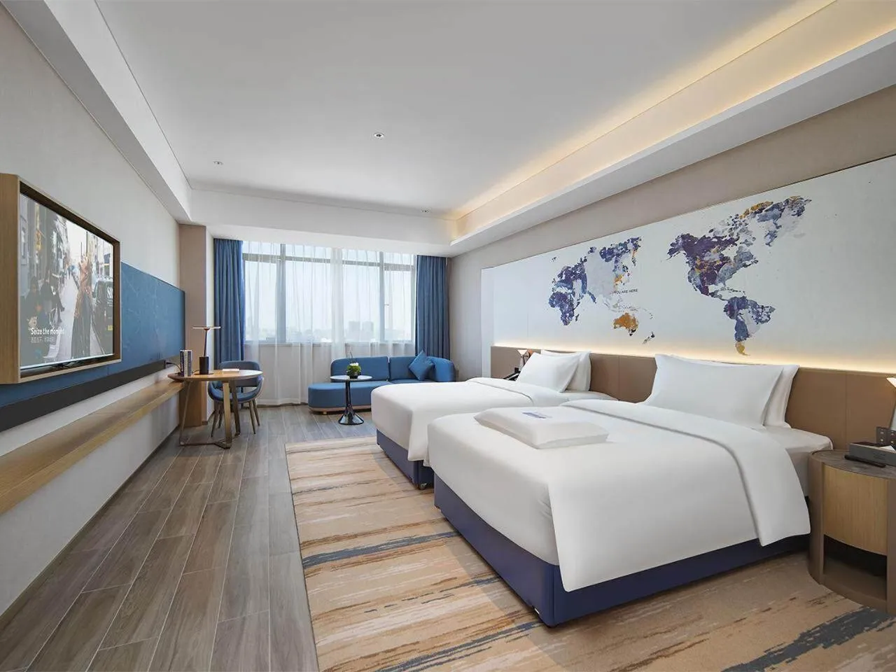 Bed in Kyriad Hotel Dongguan Houjie Convention and Exhibition Center Humen Station