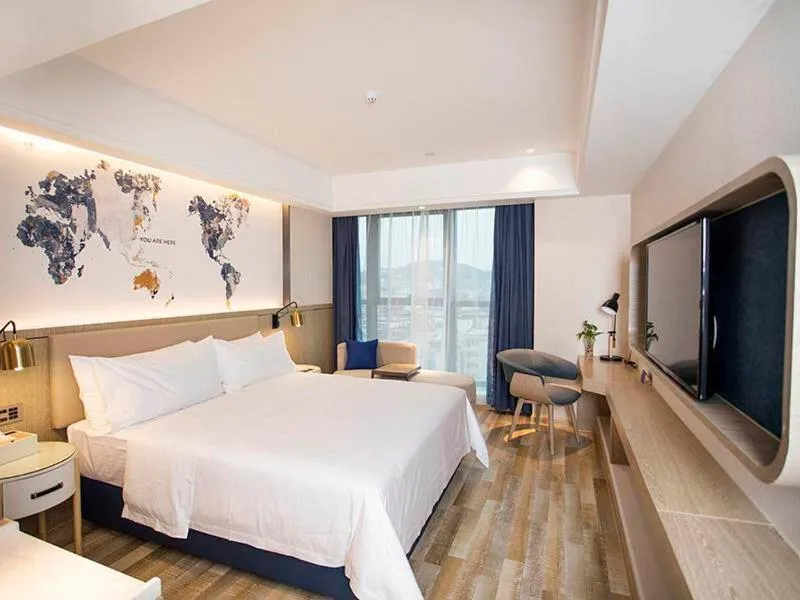 Bed in Kyriad Marvelous Hotel Foshan Xiqiao Mountain Scenic Area Qiaoling Square