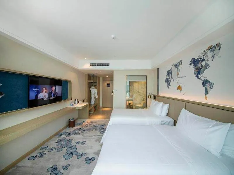 Bed in Kyriad Marvelous Hotel Foshan Xiqiao Mountain Scenic Area Qiaoling Square