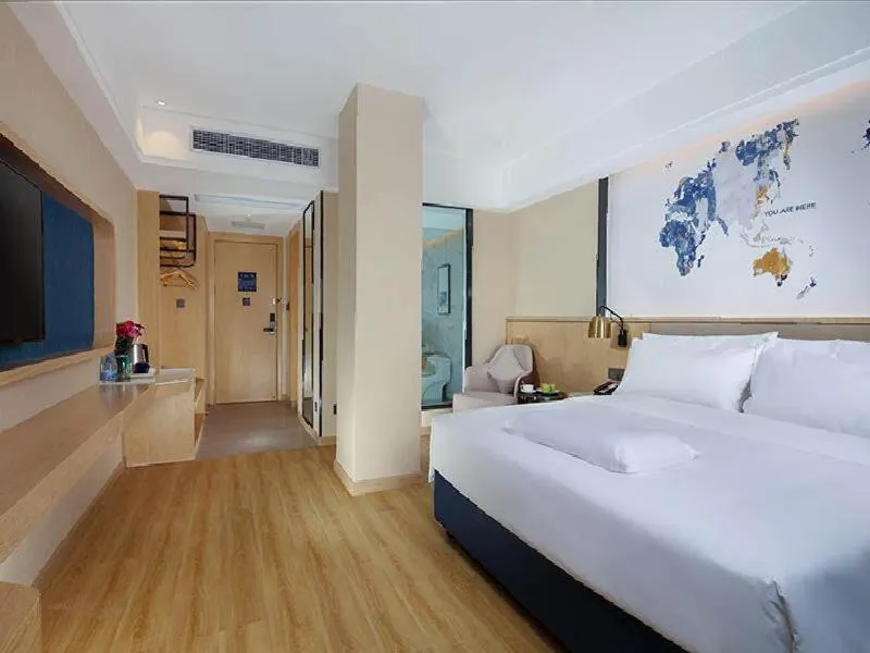 Bed in Kyriad Marvelous Hotel Zhongshan West District
