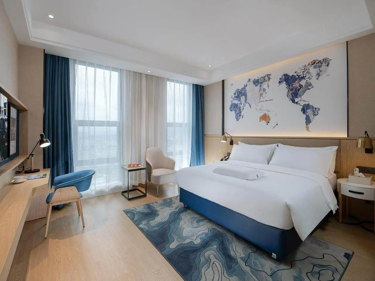 Bed in Kyriad Marvelous Hotel Guilin Quanzhou