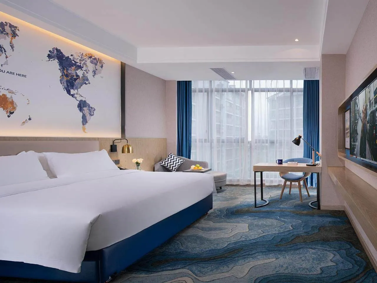 Bed in Kyriad Marvelous Hotel Hezhou Wanda Plaza