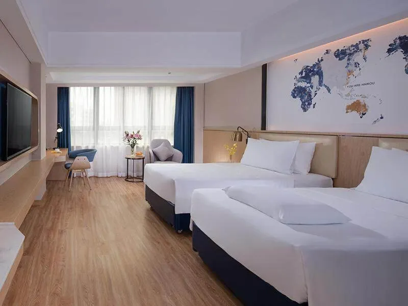 Bed in Kyriad Marvelous Hotel Haikou Free Trade Zone