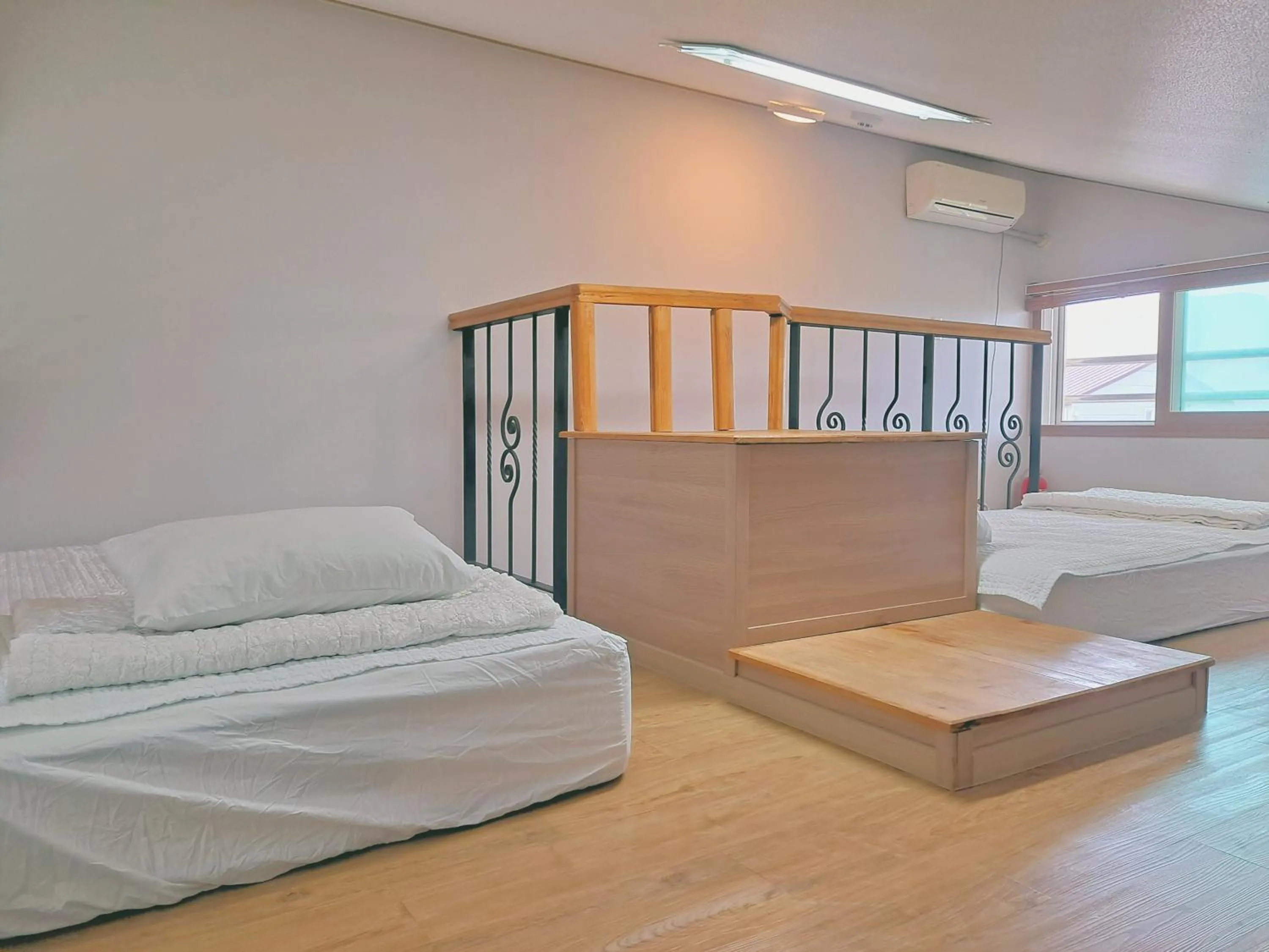 Bed in Jeju Gillime Pension