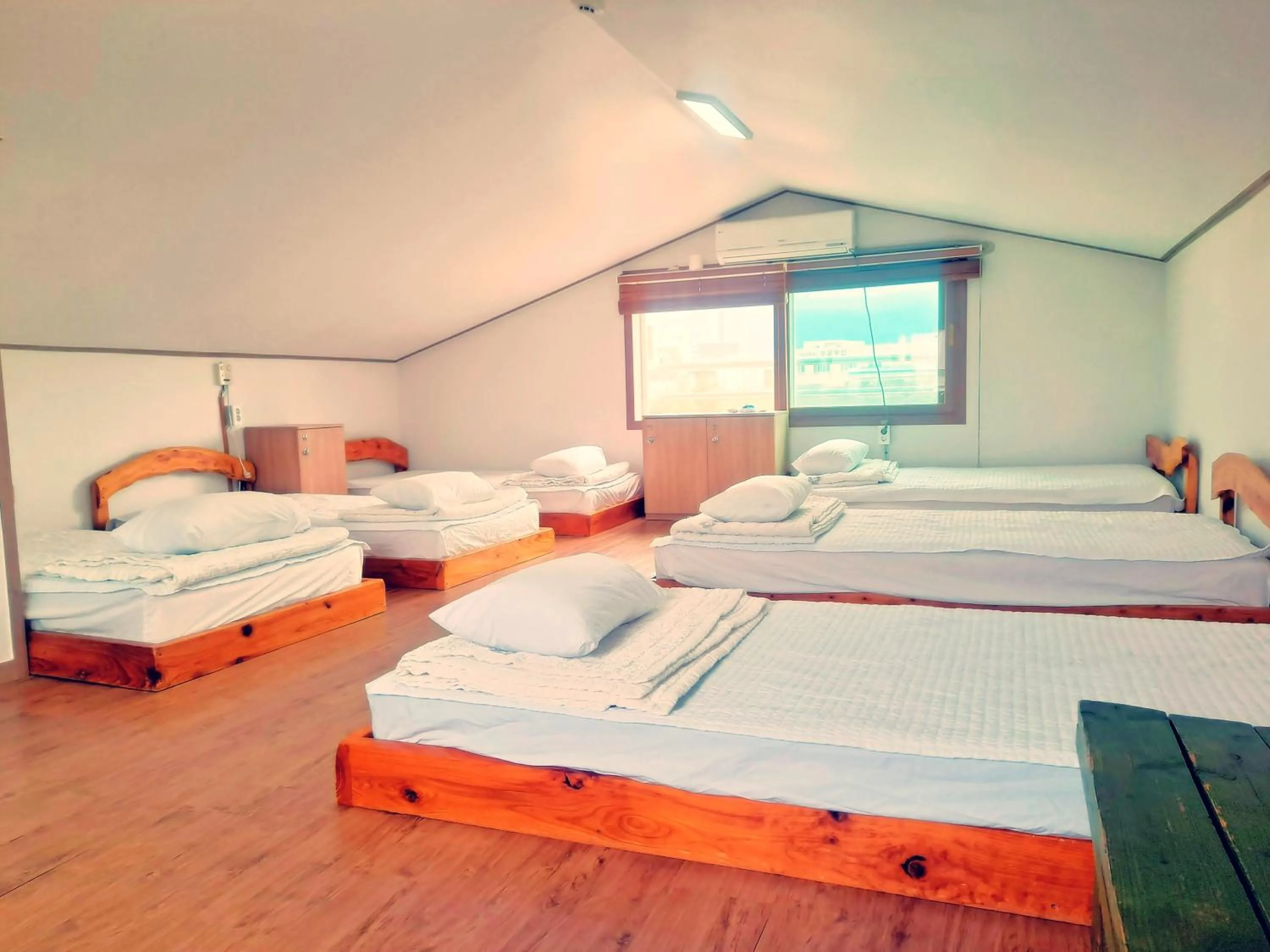 Bed in Jeju Gillime Pension