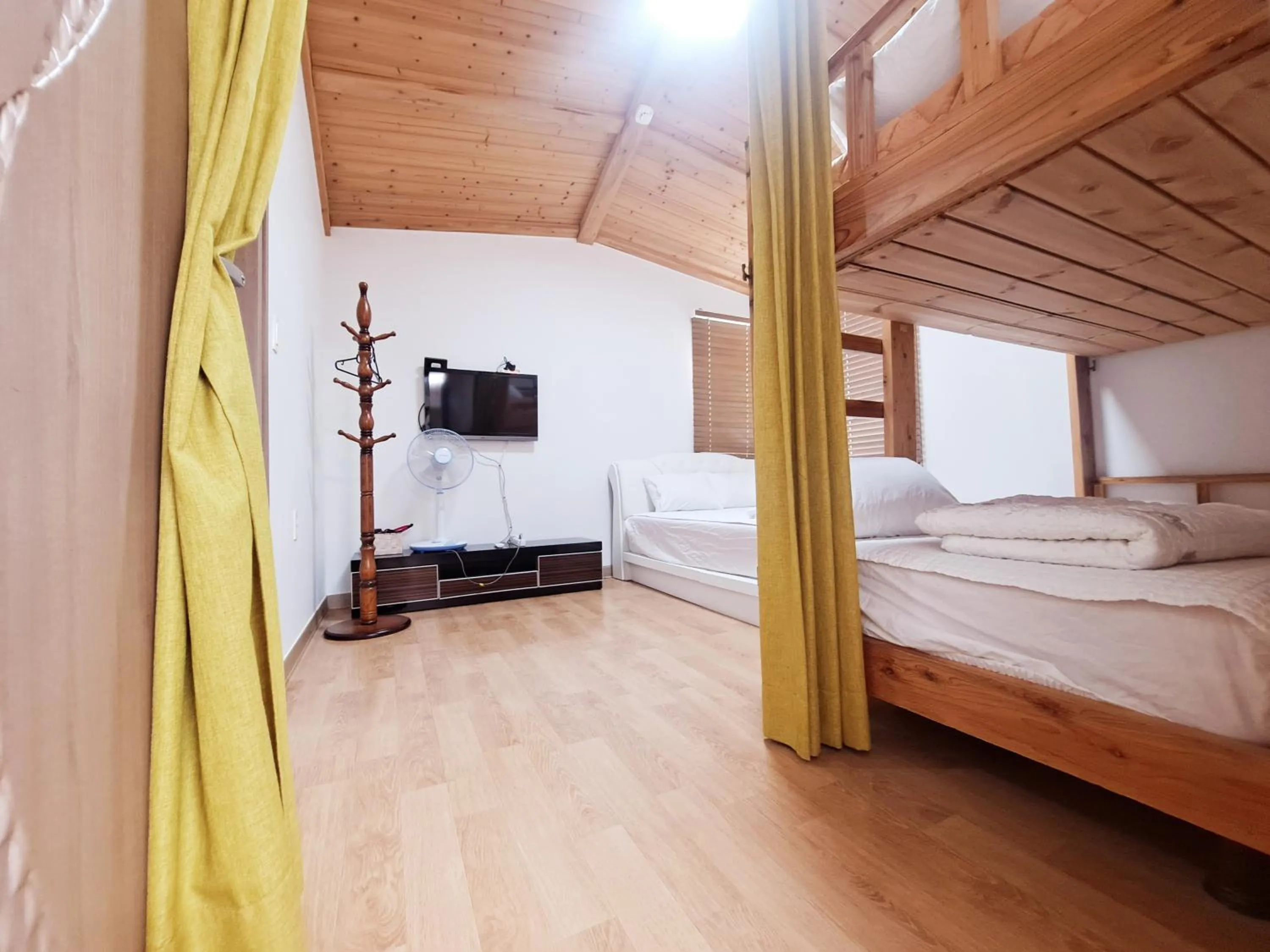 Bed in Jeju Gillime Pension