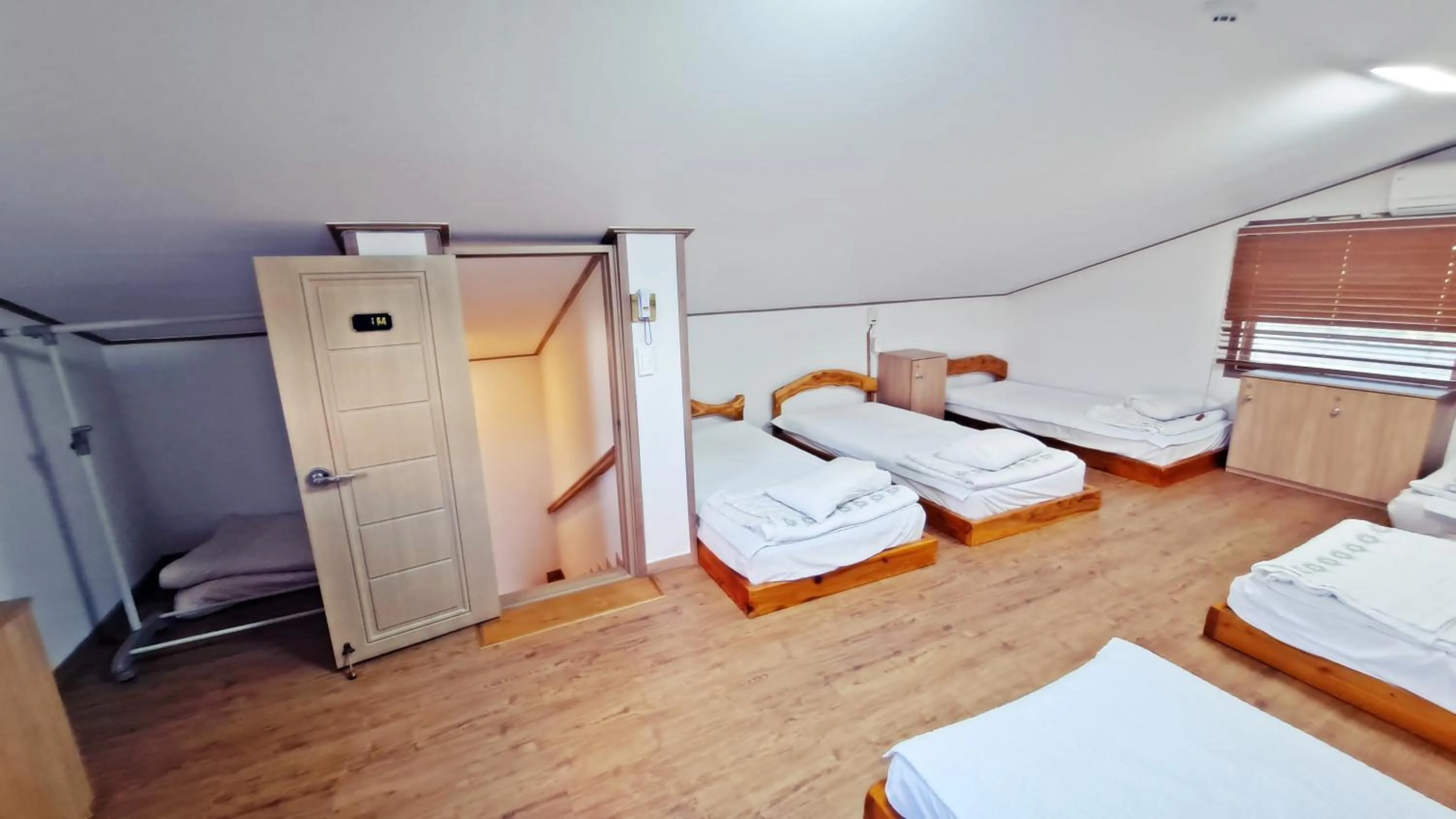 Bed in Jeju Gillime Pension