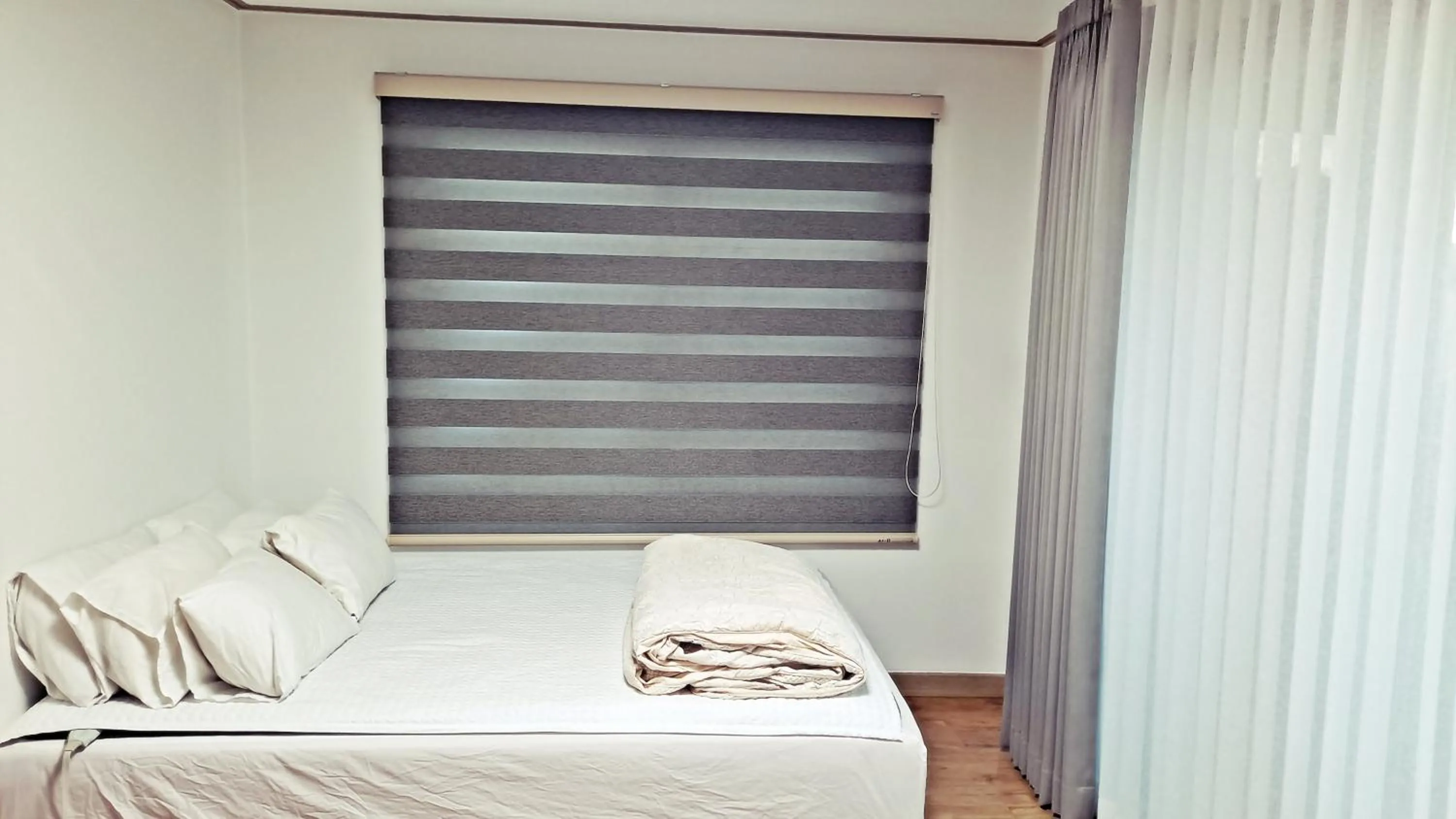 Bed in Jeju Gillime Pension