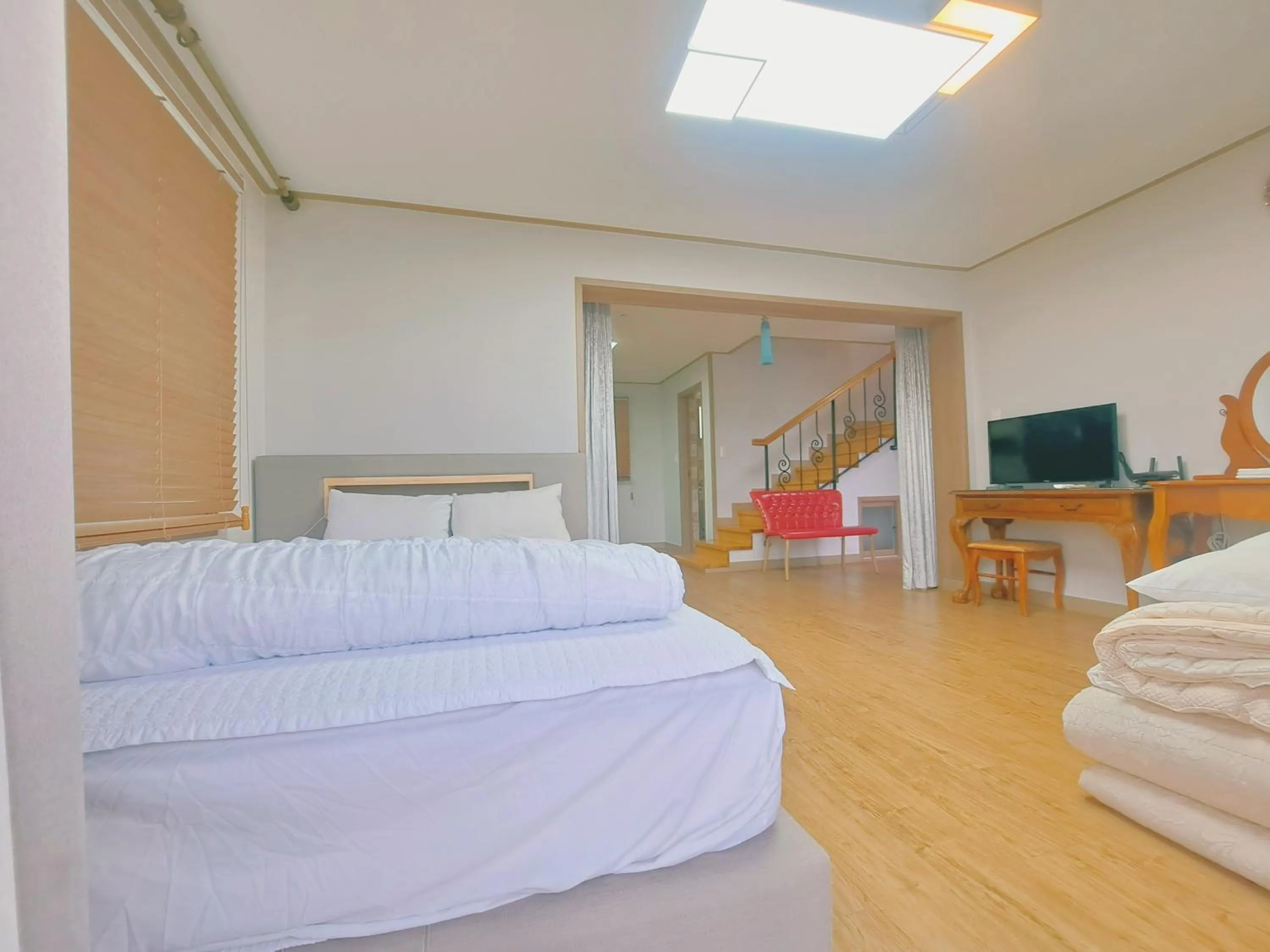 Bed in Jeju Gillime Pension