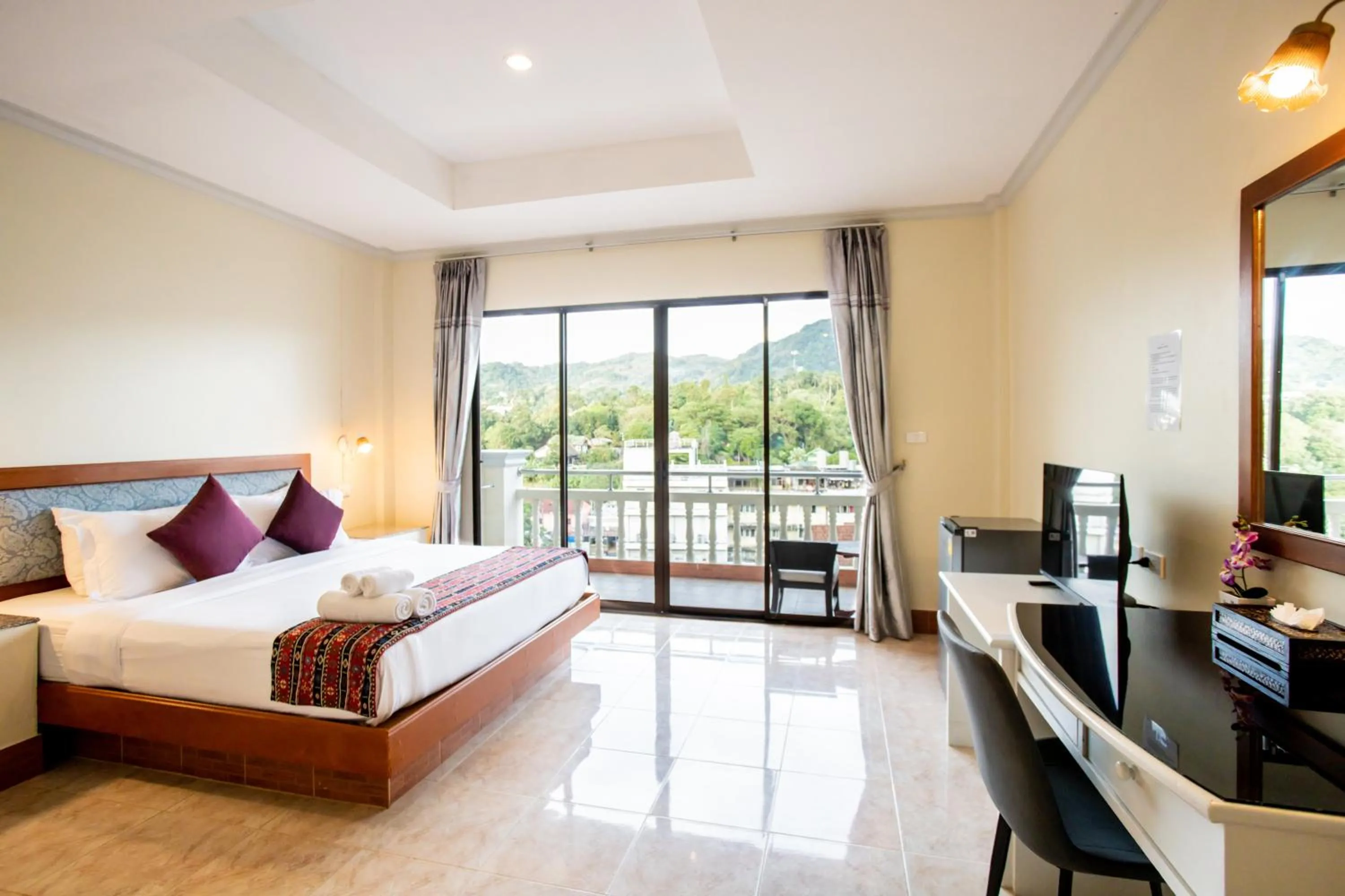 Bed in Tri's Miracle Kata Beach Side