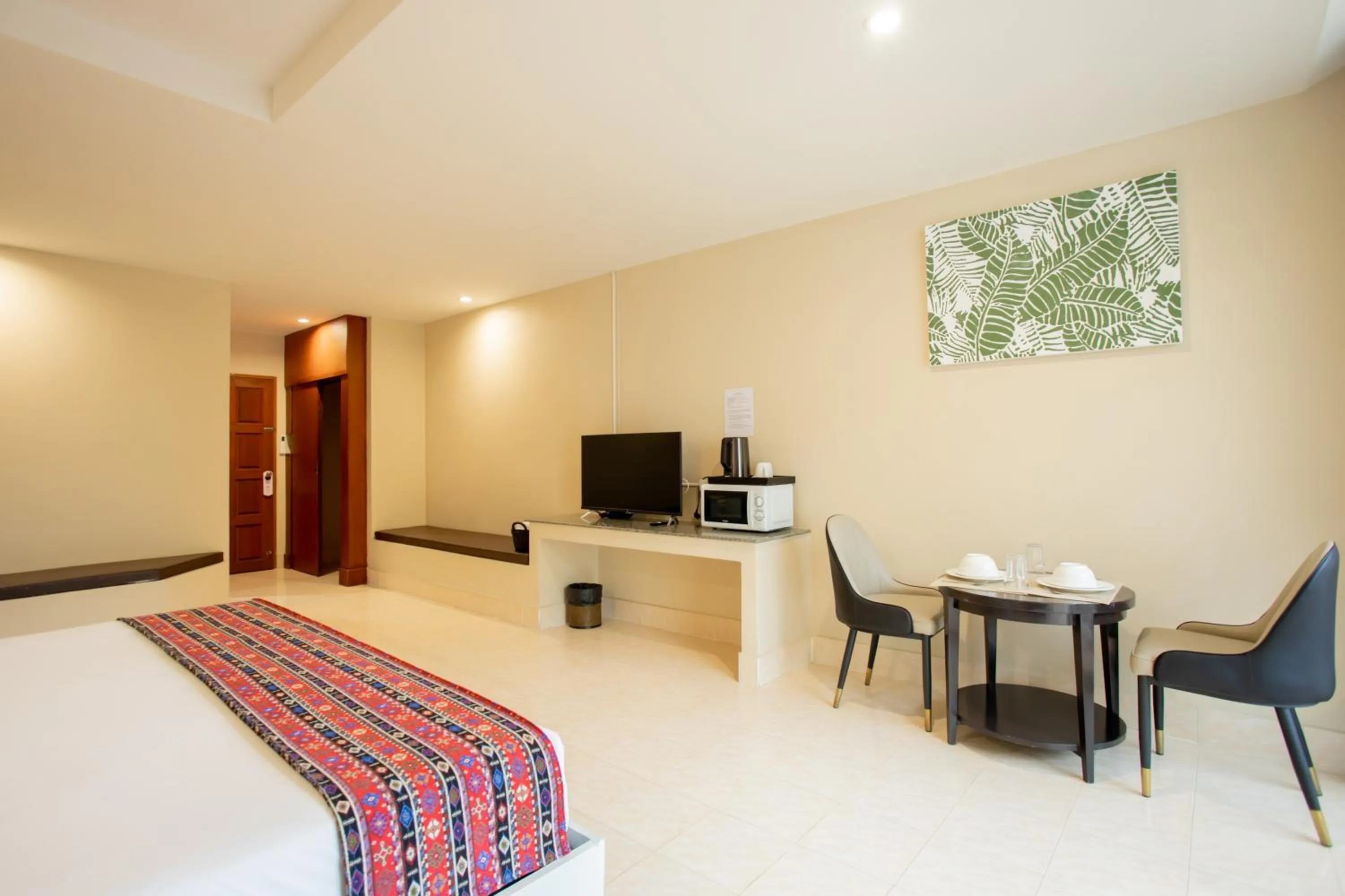 Bed in Tri's Miracle Kata Beach Side