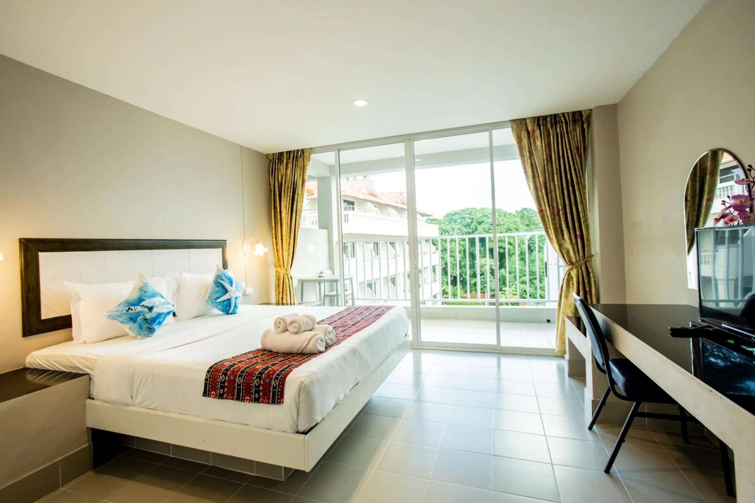 Bed in Tri's Miracle Kata Beach Side