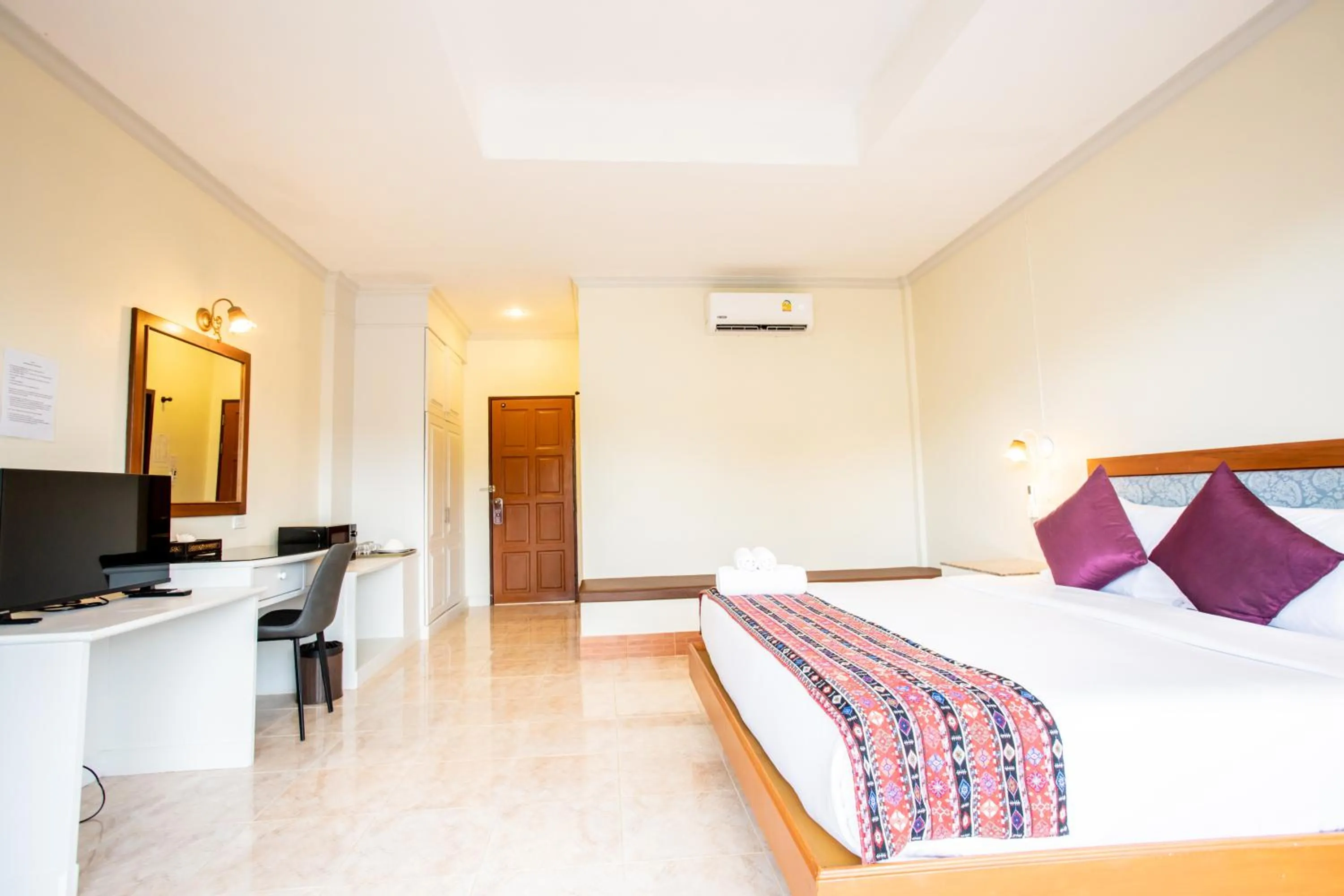 Bed in Tri's Miracle Kata Beach Side