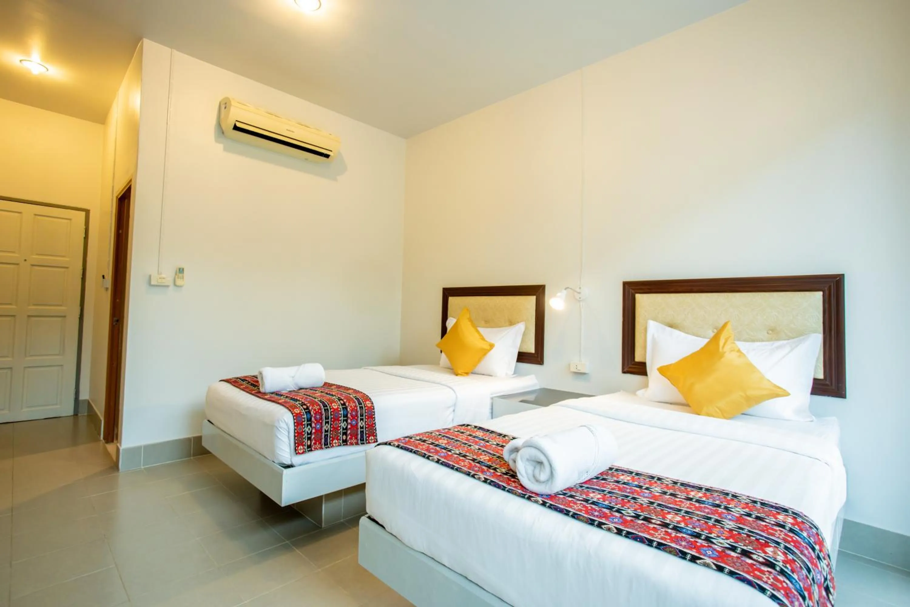 Bed in Tri's Miracle Kata Beach Side