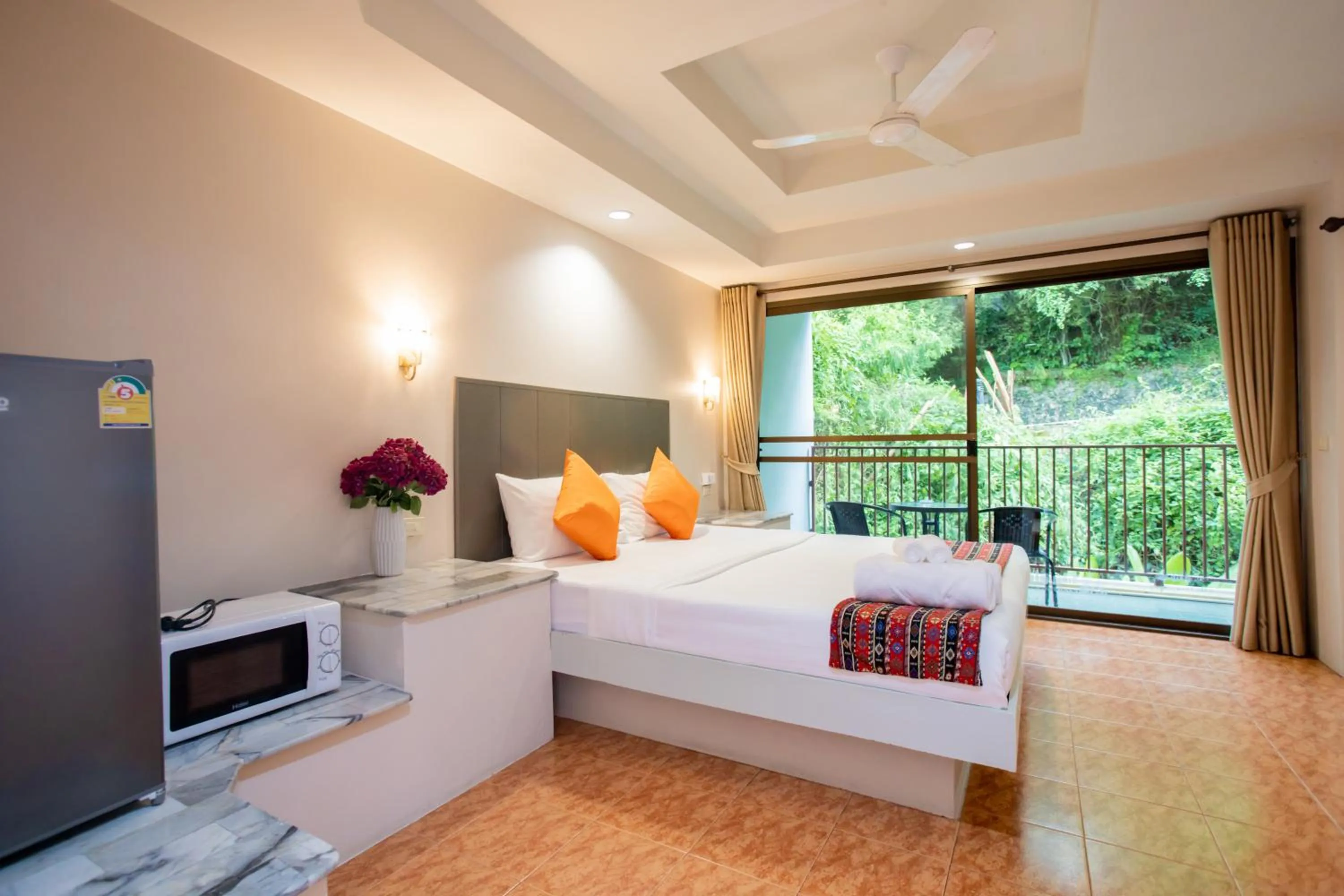 Bed in Tri's Miracle Kata Beach Side