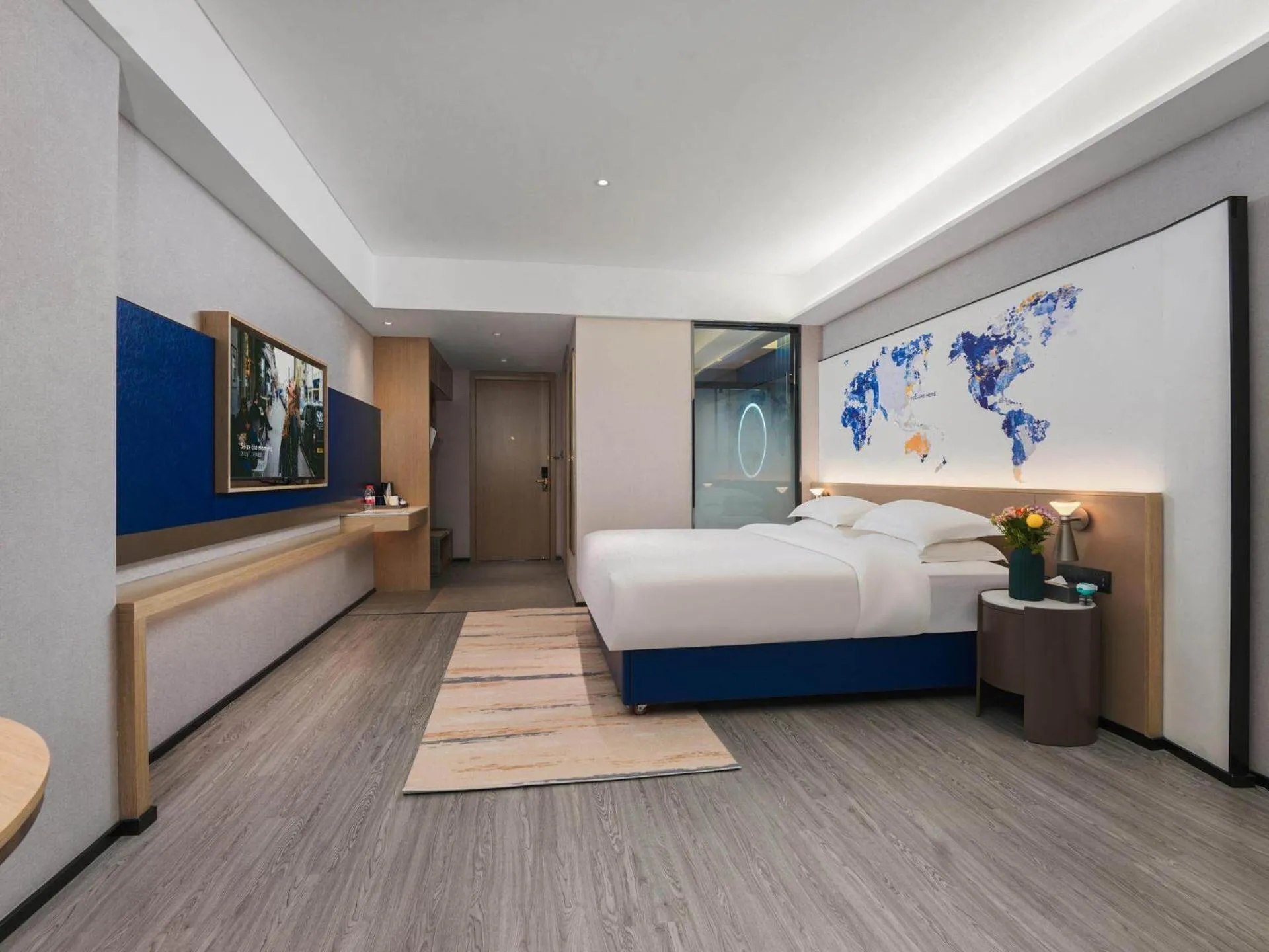 Bed in Kyriad Hotel Baoying Jinyuan Square High-speed Railway Station