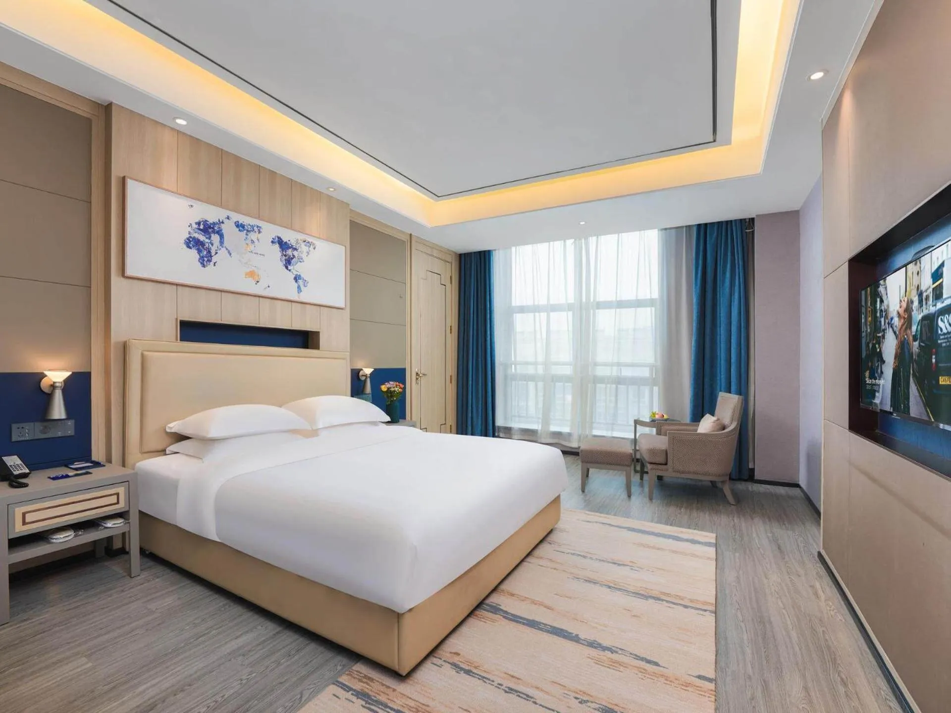 Bed in Kyriad Hotel Baoying Jinyuan Square High-speed Railway Station