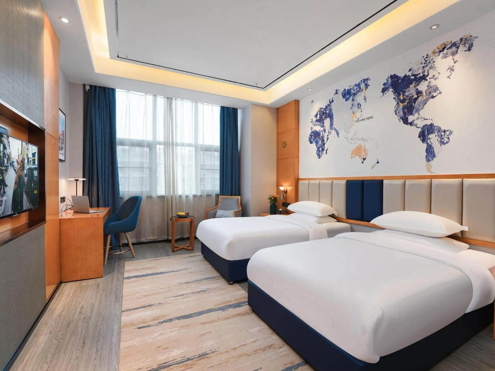 Bed in Kyriad Hotel Baoying Jinyuan Square High-speed Railway Station