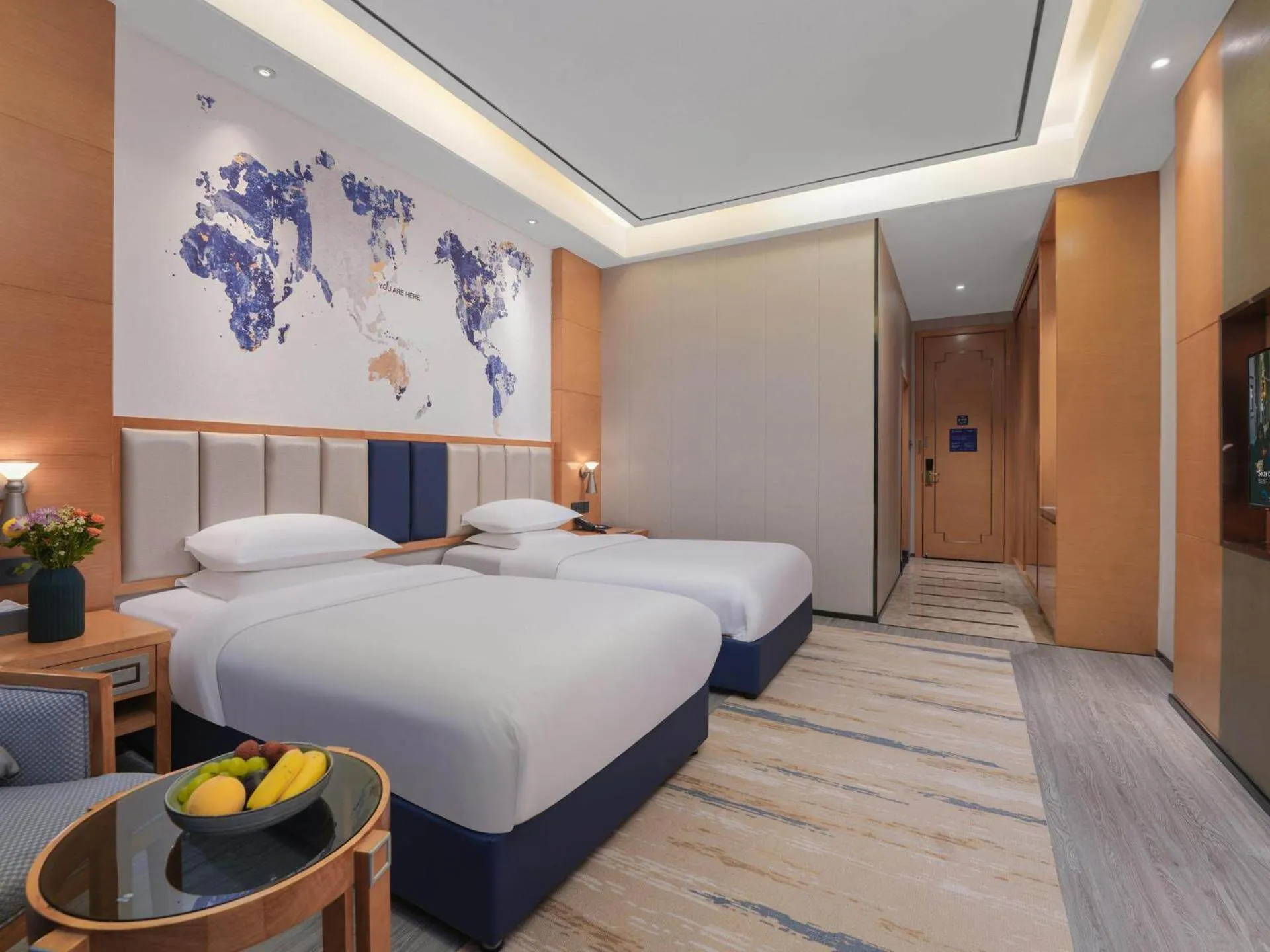 Bed in Kyriad Hotel Baoying Jinyuan Square High-speed Railway Station