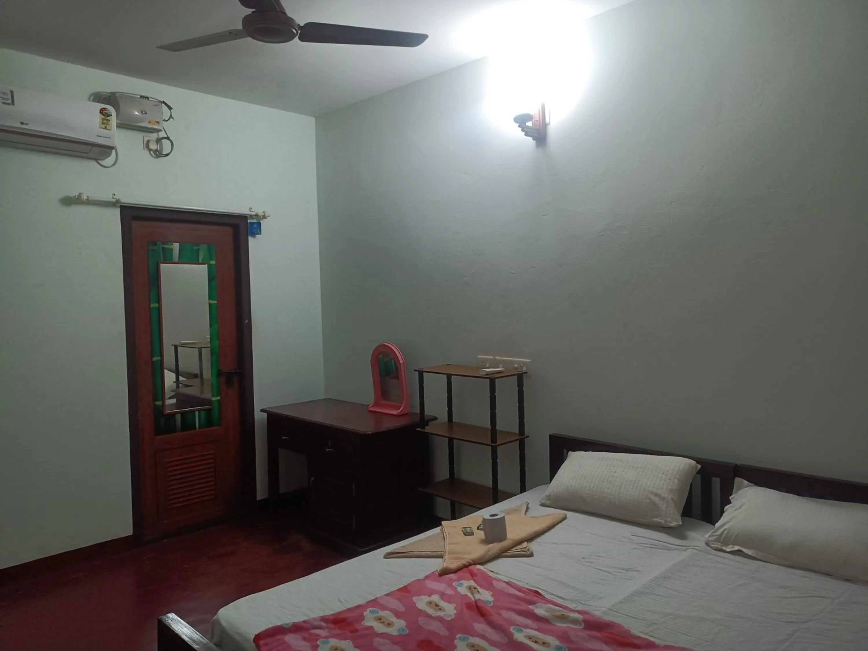 Bed in Angels' homestay Marari