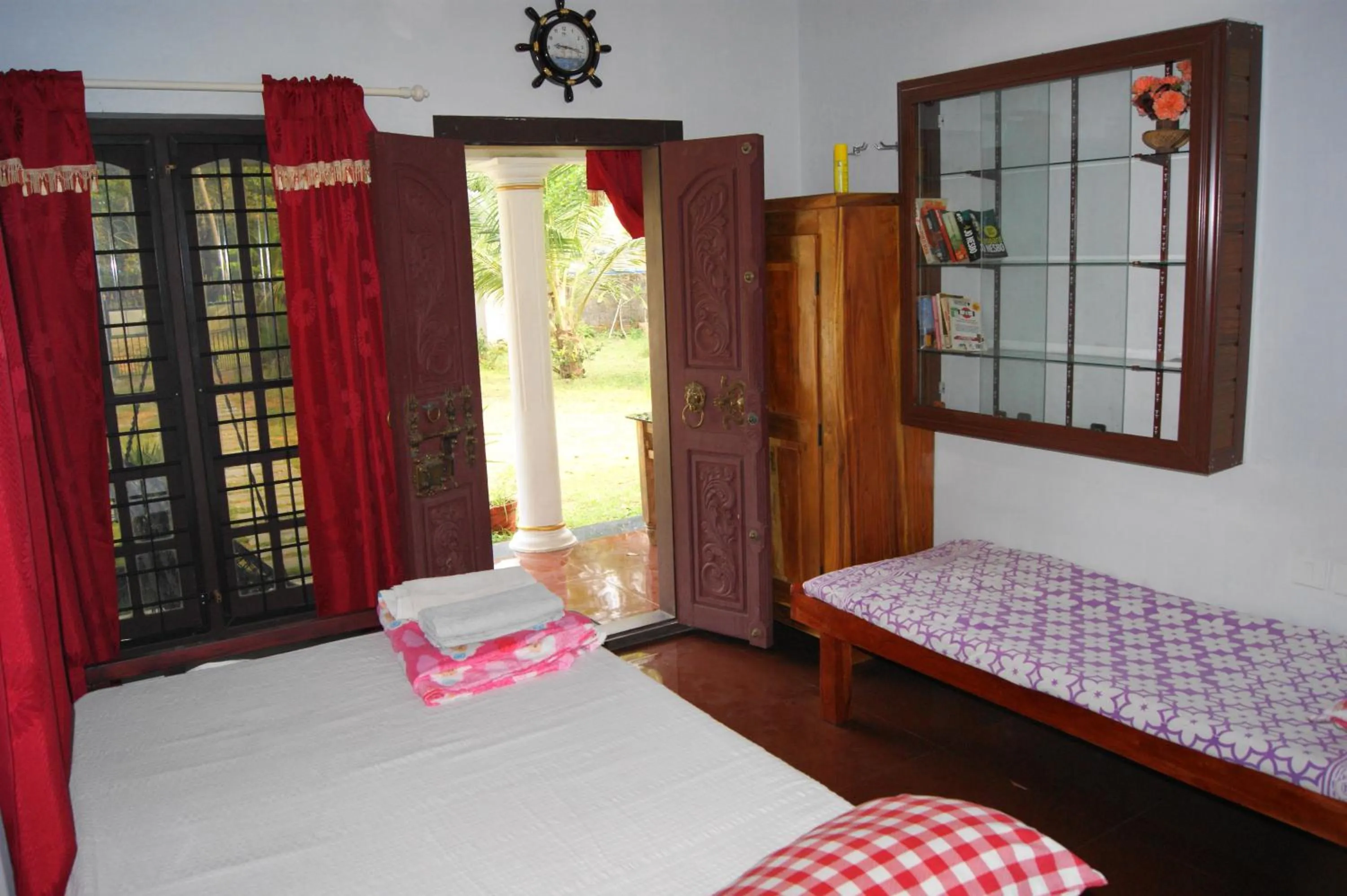 Bed in Angels' homestay Marari