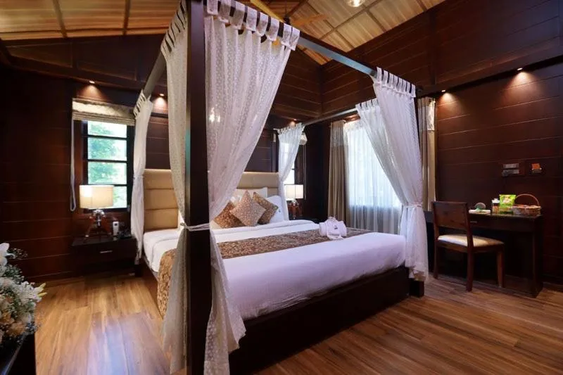 Bed in Maliekal Heritance Cherai Beach Cochin