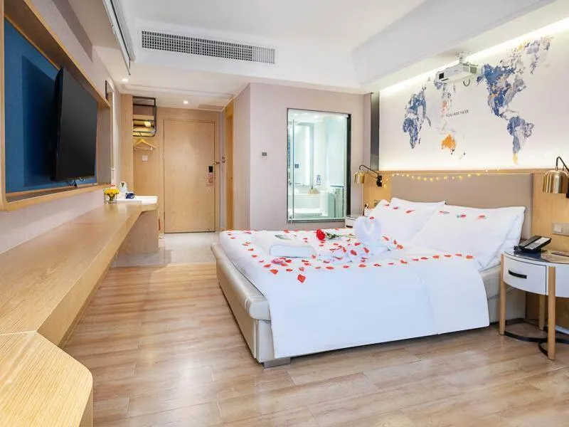 Bed in Kyriad Marvelous Hotel Dongguan Changan Light Rail Station