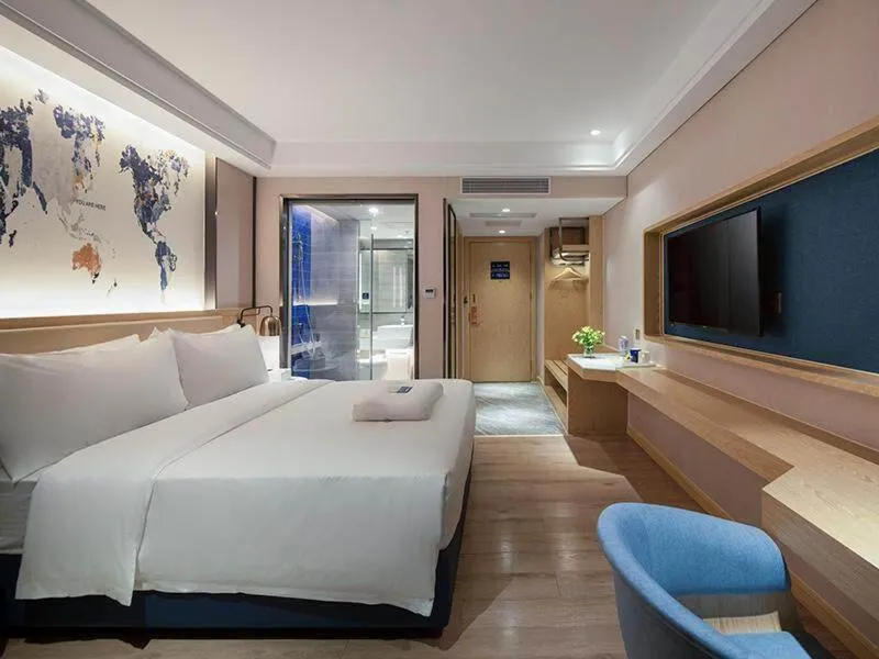 Bed in Kyriad Marvelous Hotel Shenzhen Longhua Dalang Business Center