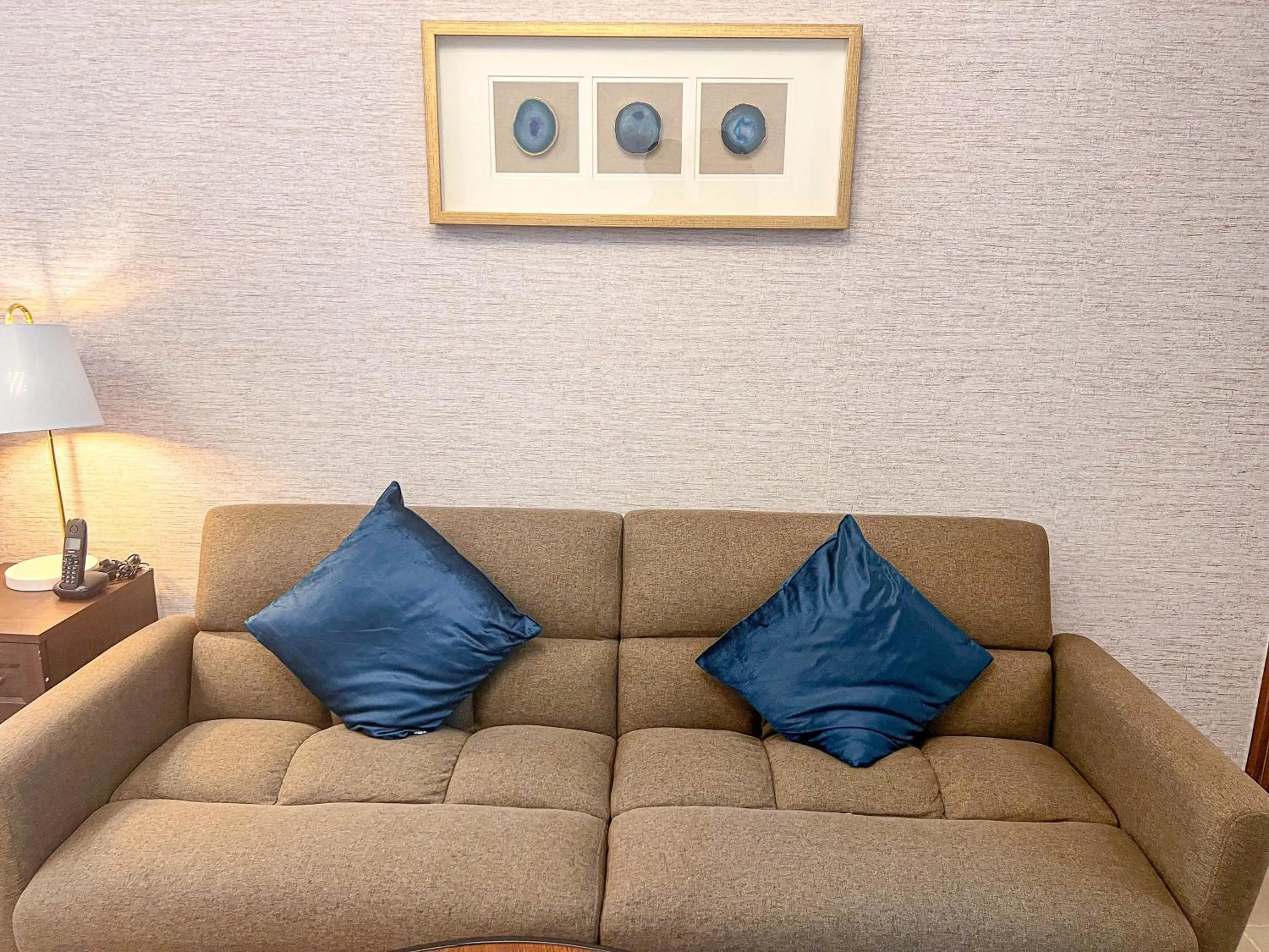 Bed in Cosmos Living Luxurious Studio Near Metro