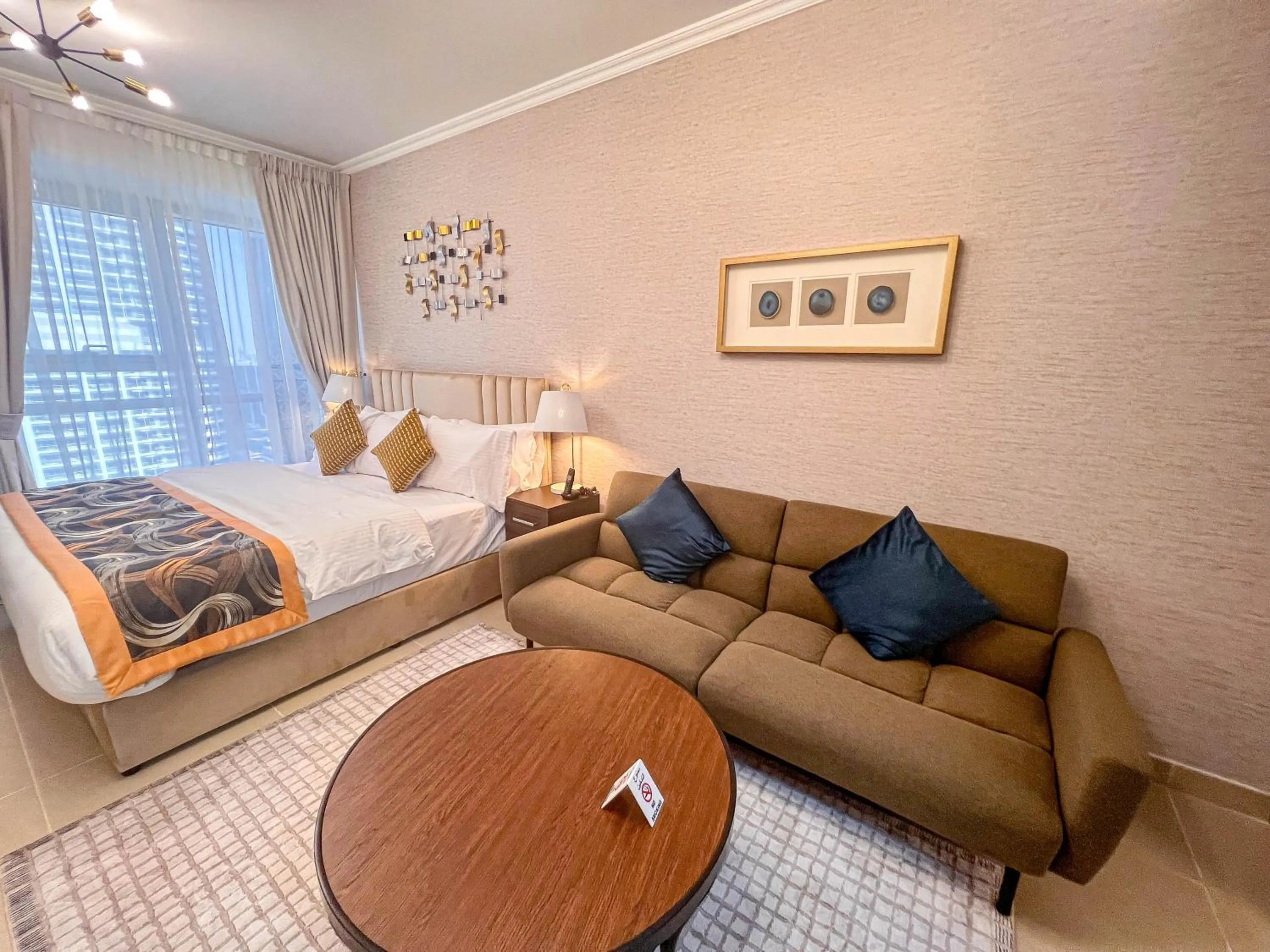 Living room in Cosmos Living Luxurious Studio Near Metro