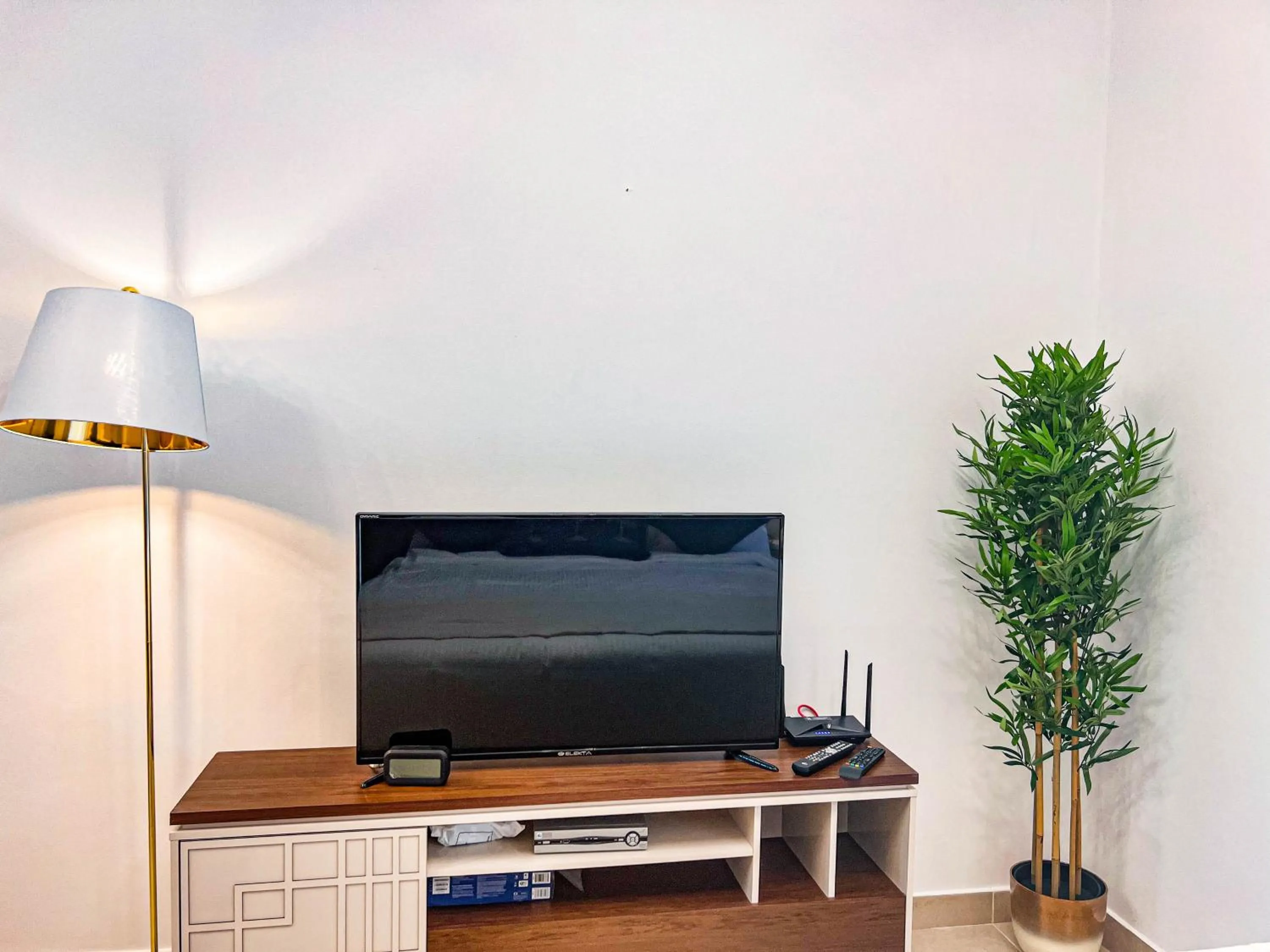 TV and multimedia in Cosmos Living Luxurious Studio Near Metro