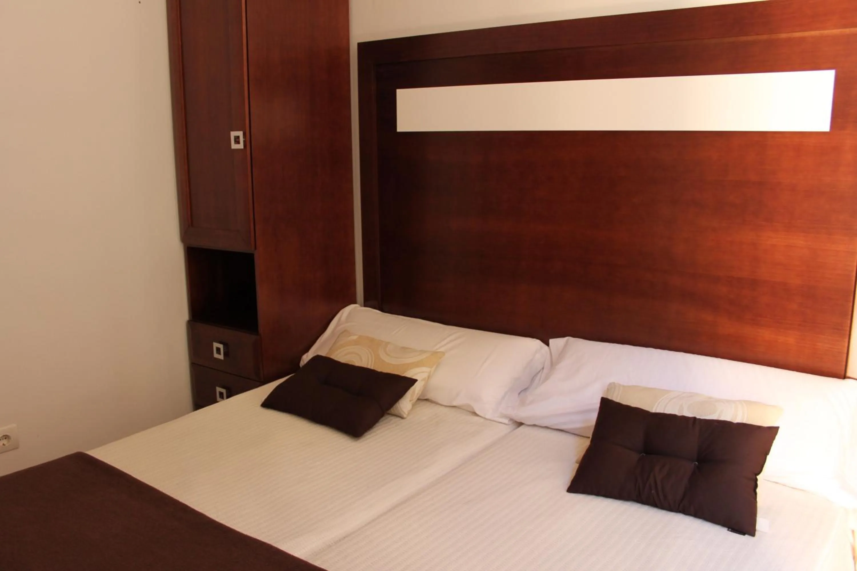 Bed in Apartamentos Casa de la Lonja