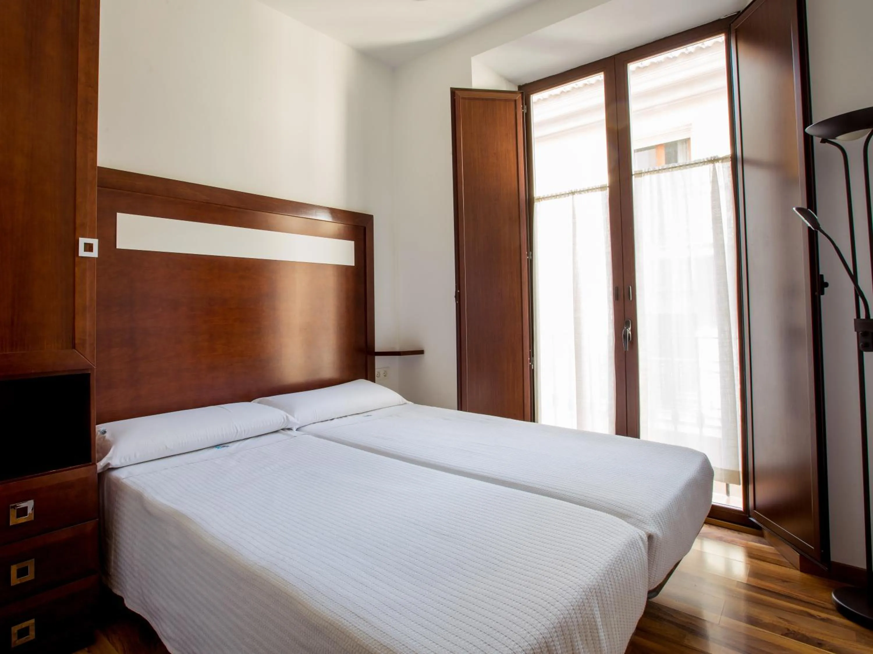 Bed in Apartamentos Casa de la Lonja