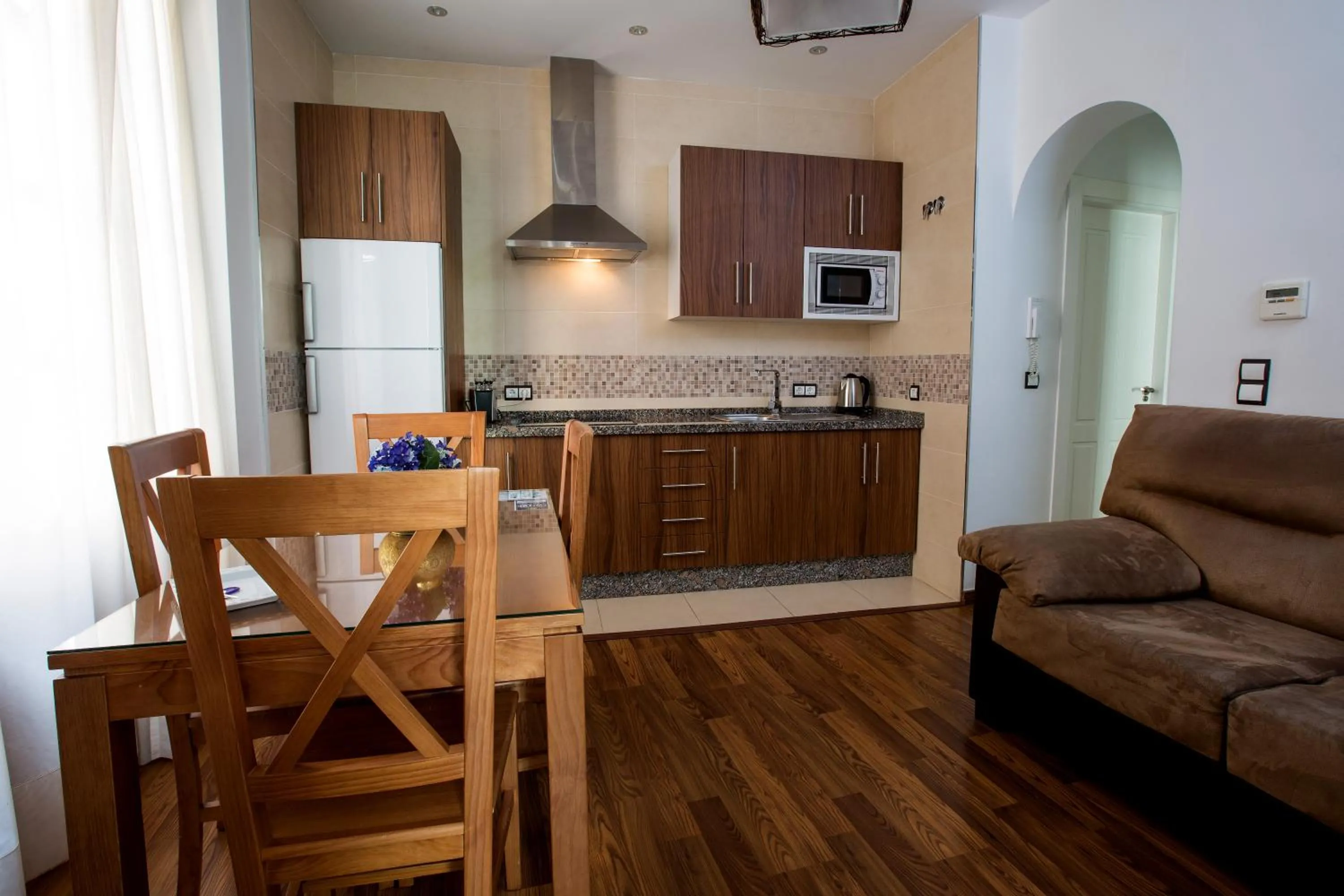 Kitchen or kitchenette in Apartamentos Casa de la Lonja