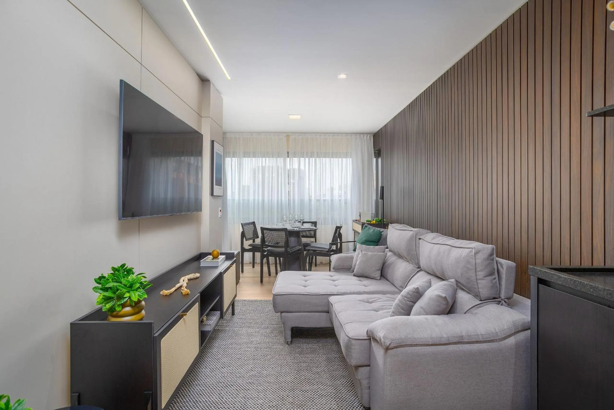 Living room in DSG Itaim by Conviva