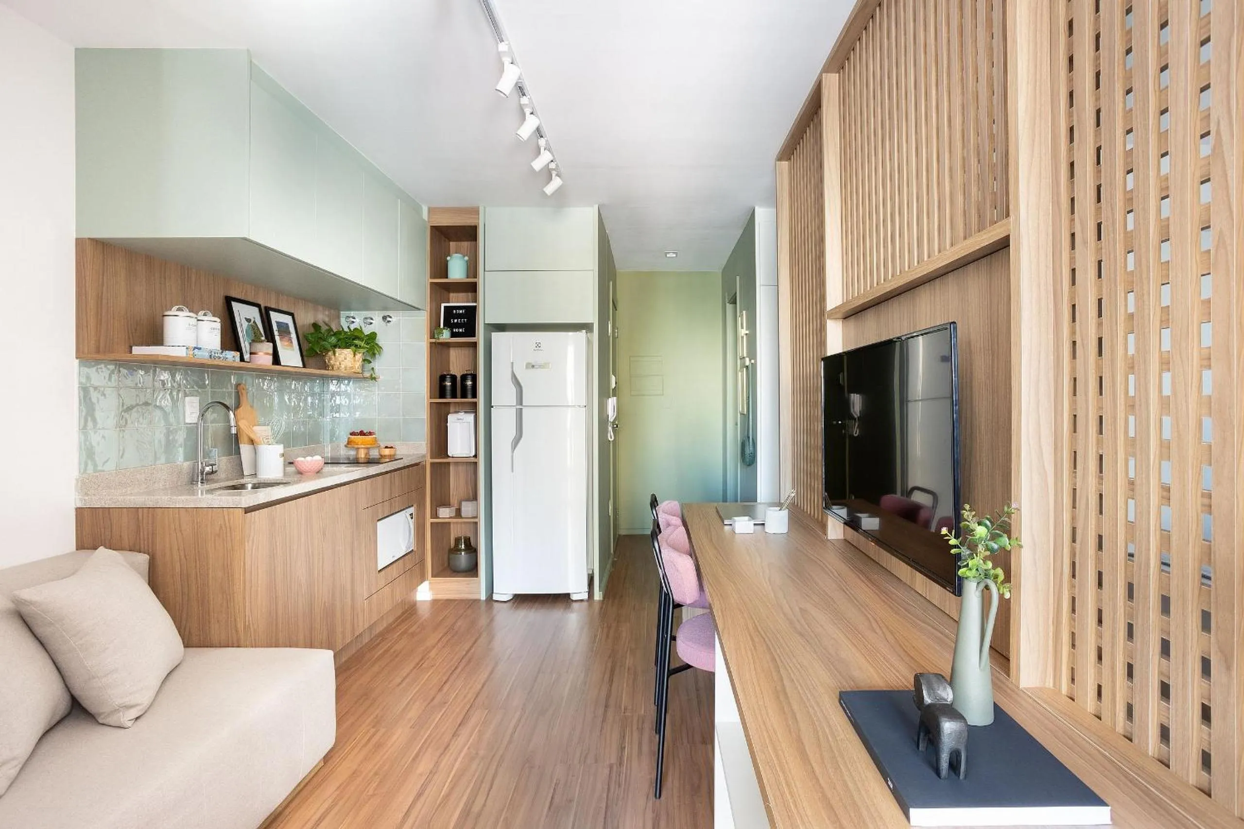 Seating area in DSG Itaim by Conviva