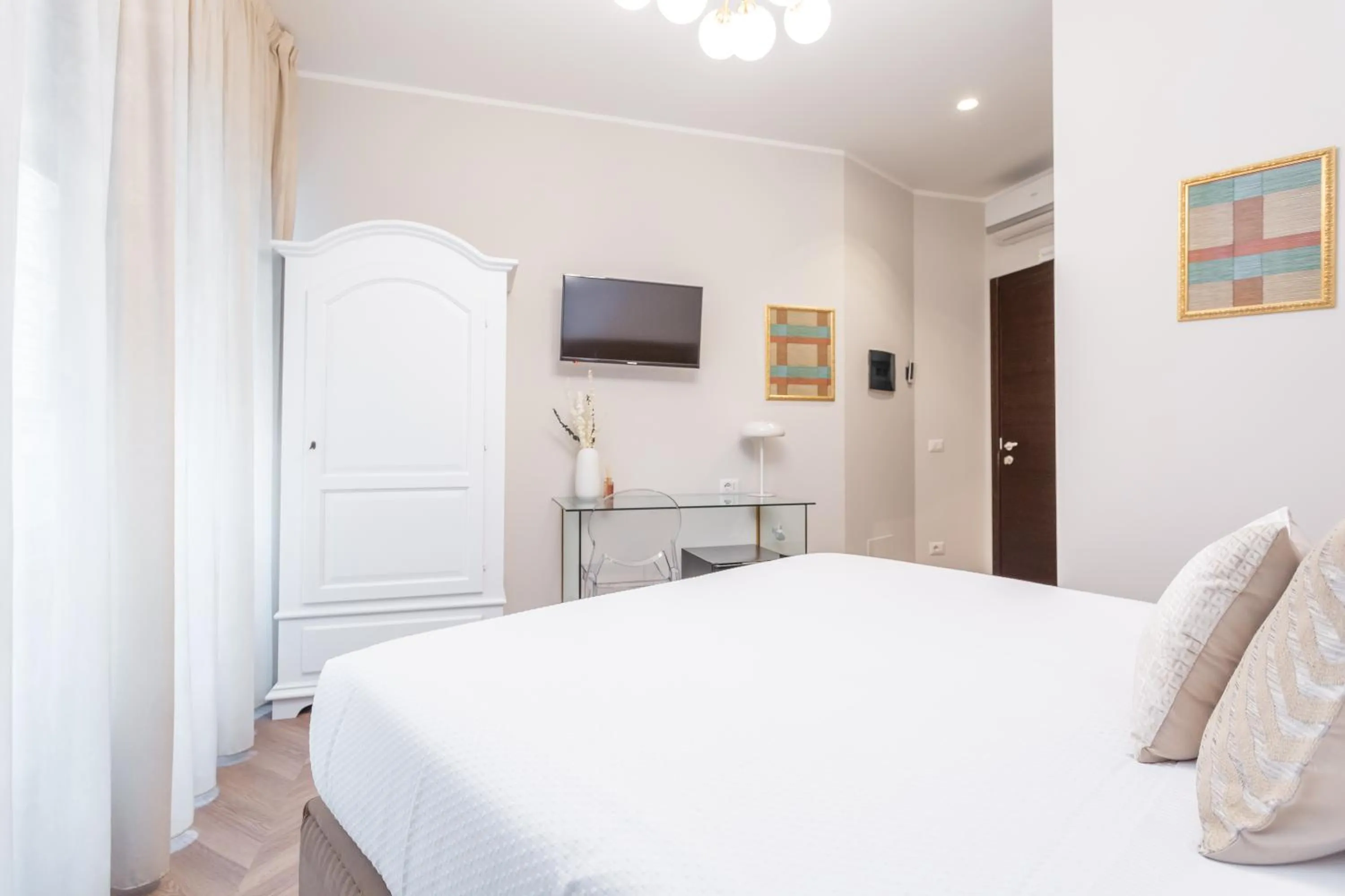 Bed in Daplace - Gran Torino Suites