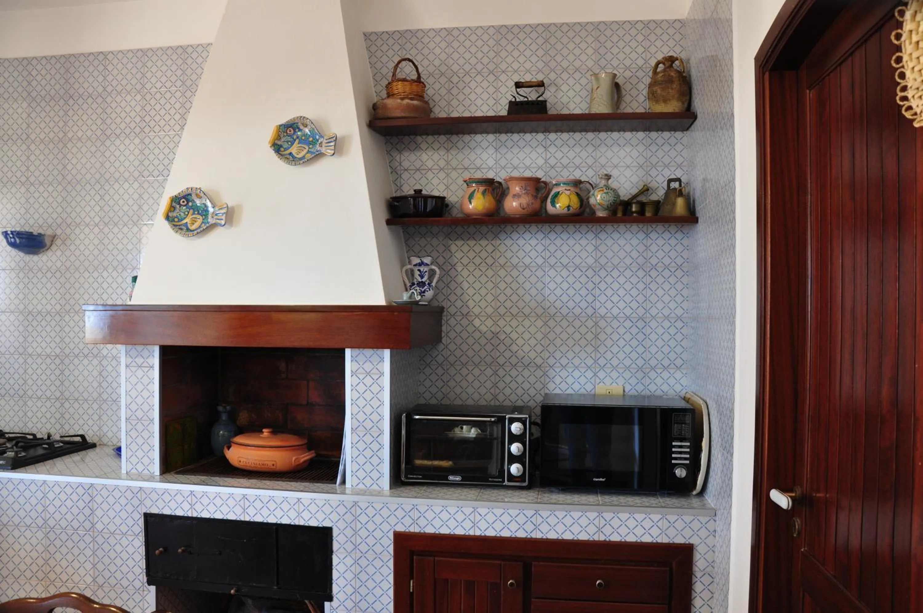 Kitchen or kitchenette in Villa Cala Rossa Antonella