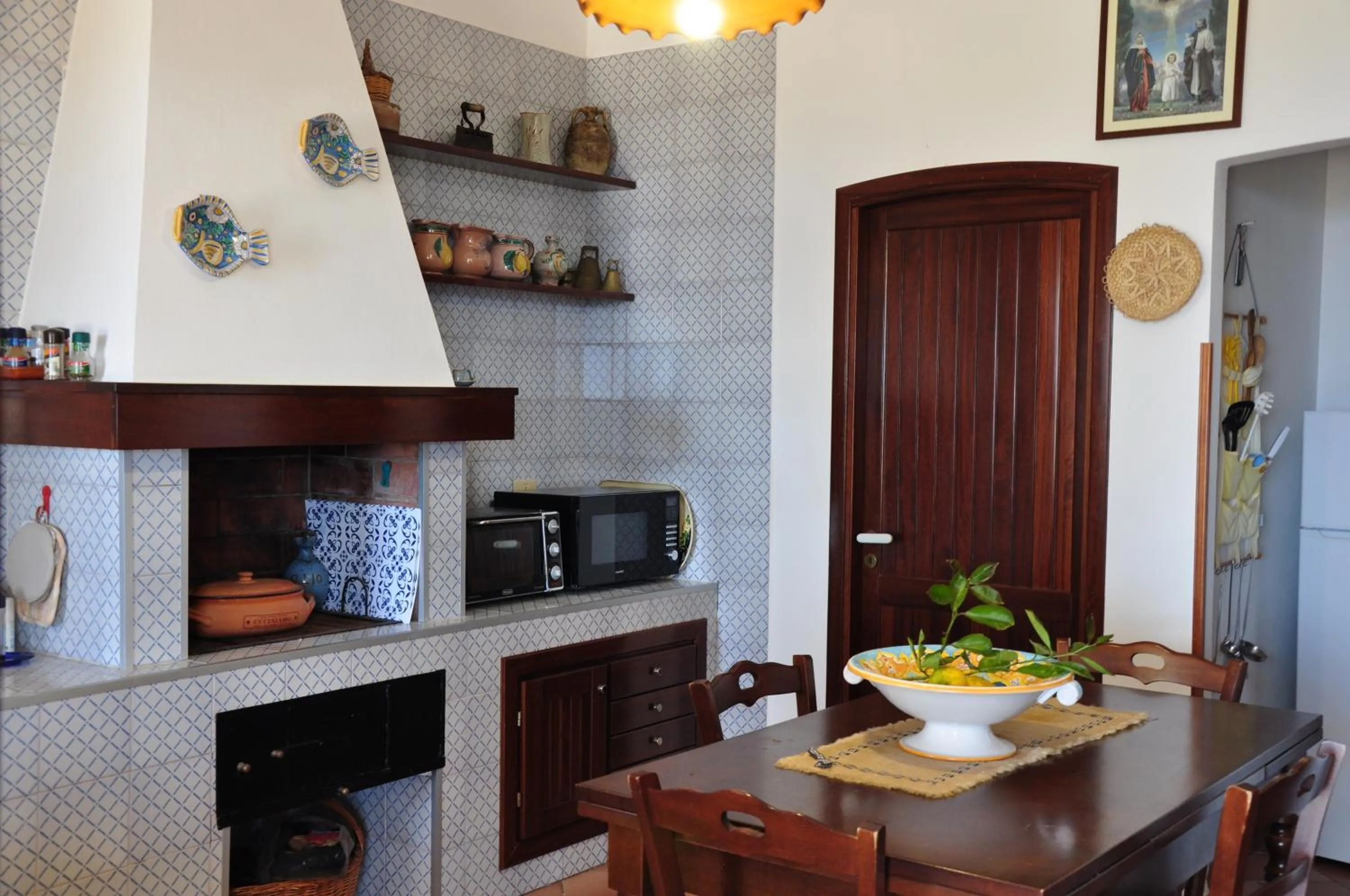 Kitchen or kitchenette in Villa Cala Rossa Antonella