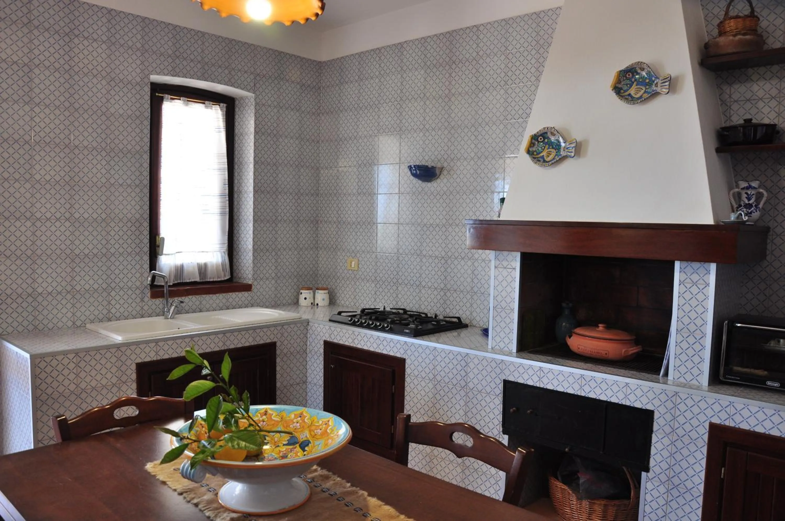 Kitchen or kitchenette in Villa Cala Rossa Antonella